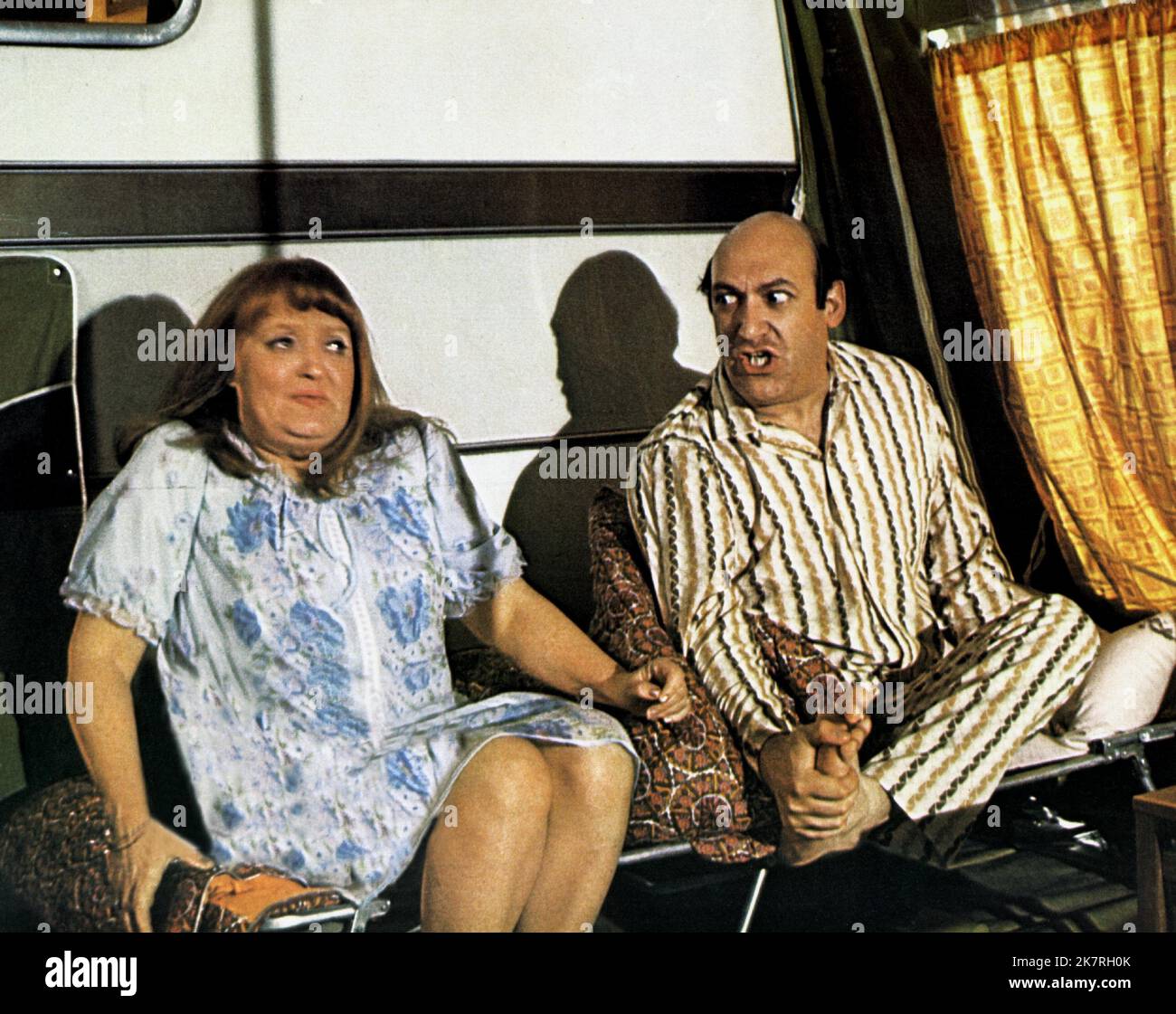 Carry on behind 1975 patsy rowlands hires stock photography and images