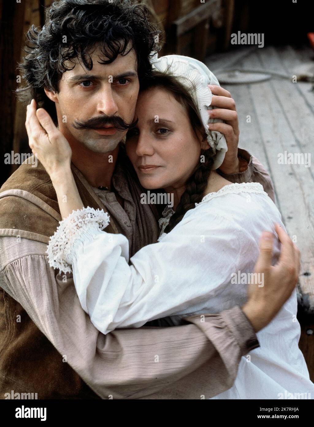 David Dukes & Trish Van Devere Film: Mayflower: The Pilgrims' Adventure (1979) Characters: Miles Standish & Rose Standish  Director: George Schaefer 21 November 1979   **WARNING** This Photograph is for editorial use only and is the copyright of CBS TELEVISION and/or the Photographer assigned by the Film or Production Company and can only be reproduced by publications in conjunction with the promotion of the above Film. A Mandatory Credit To CBS TELEVISION is required. The Photographer should also be credited when known. No commercial use can be granted without written authority from the Film Stock Photo