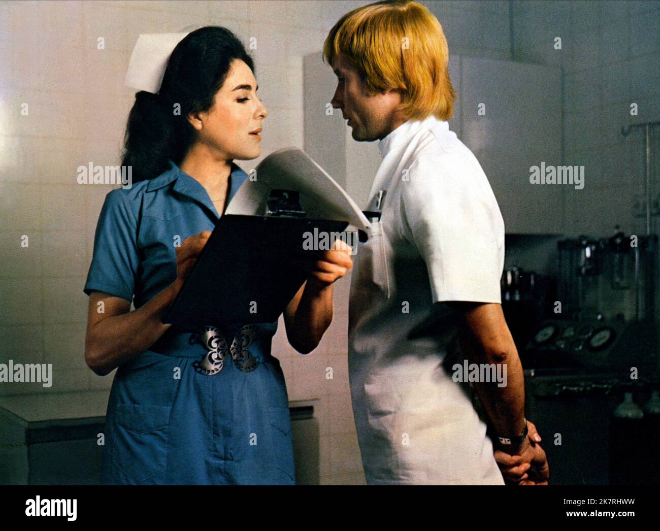 Eleanor Bron & Jim Dale Film: The National Health (1973) Characters: Sister McFee / Sister Mary MacArthur & Barnet / Dr. Neil Boyd  Director: Jack Gold 01 June 1973   **WARNING** This Photograph is for editorial use only and is the copyright of COLUMBIA and/or the Photographer assigned by the Film or Production Company and can only be reproduced by publications in conjunction with the promotion of the above Film. A Mandatory Credit To COLUMBIA is required. The Photographer should also be credited when known. No commercial use can be granted without written authority from the Film Company. Stock Photo