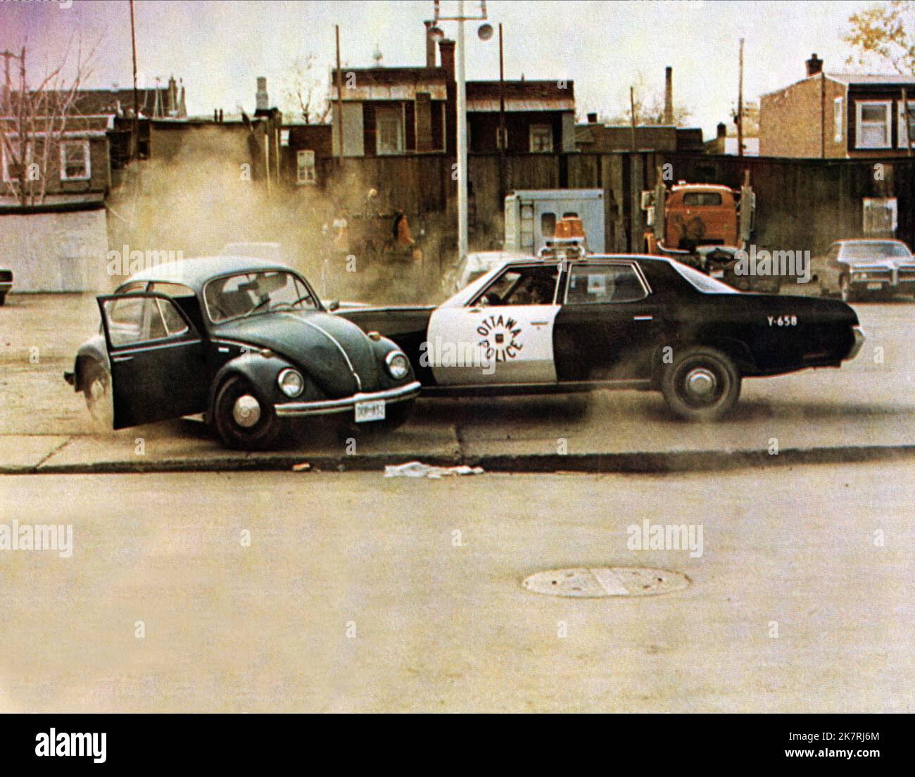 Police Car Crash Scene Film: Blazing Magnum; Shadows In An Empty Room; Tough Tony Saitta (Una Magnum Special per Tony Saitta)   It/Can/Pan 1976, Director: Alberto De Martino 09 March 1976   **WARNING** This Photograph is for editorial use only and is the copyright of FIDA CINEMATOGRAFICA and/or the Photographer assigned by the Film or Production Company and can only be reproduced by publications in conjunction with the promotion of the above Film. A Mandatory Credit To FIDA CINEMATOGRAFICA is required. The Photographer should also be credited when known. No commercial use can be granted withou Stock Photo