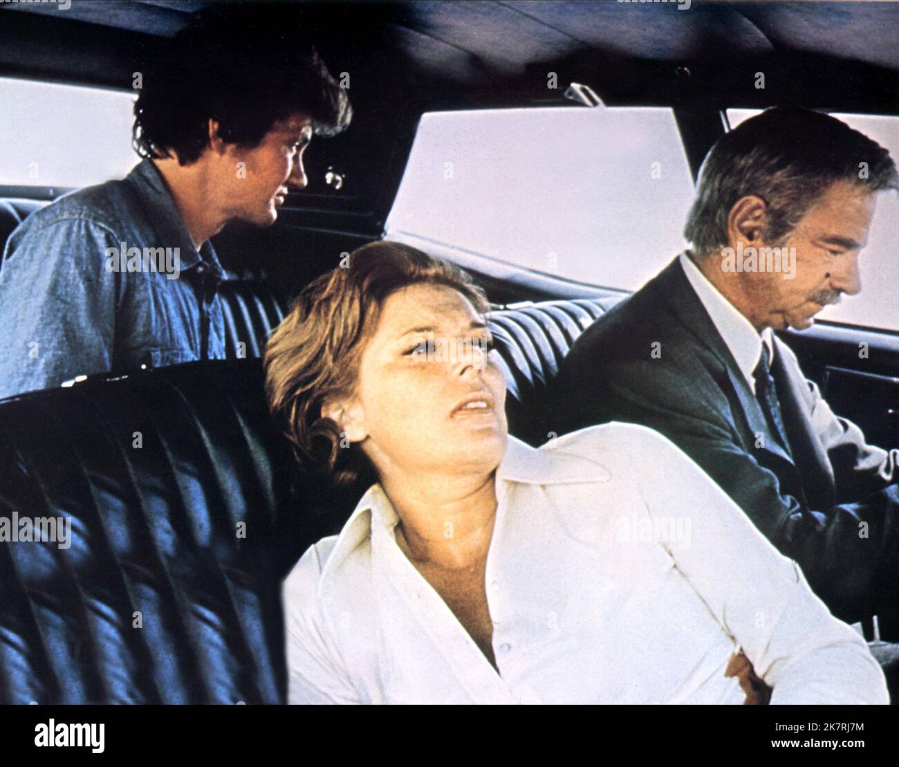 Andrew Robinson, Felicia Farr & Walter Matthau Film: Charley Varrick (1971) Characters: Harman Sullivan,Sybil Fort & Charley Varrick  Director: Don Siegel 19 September 1973   **WARNING** This Photograph is for editorial use only and is the copyright of UNIVERSAL and/or the Photographer assigned by the Film or Production Company and can only be reproduced by publications in conjunction with the promotion of the above Film. A Mandatory Credit To UNIVERSAL is required. The Photographer should also be credited when known. No commercial use can be granted without written authority from the Film Com Stock Photo