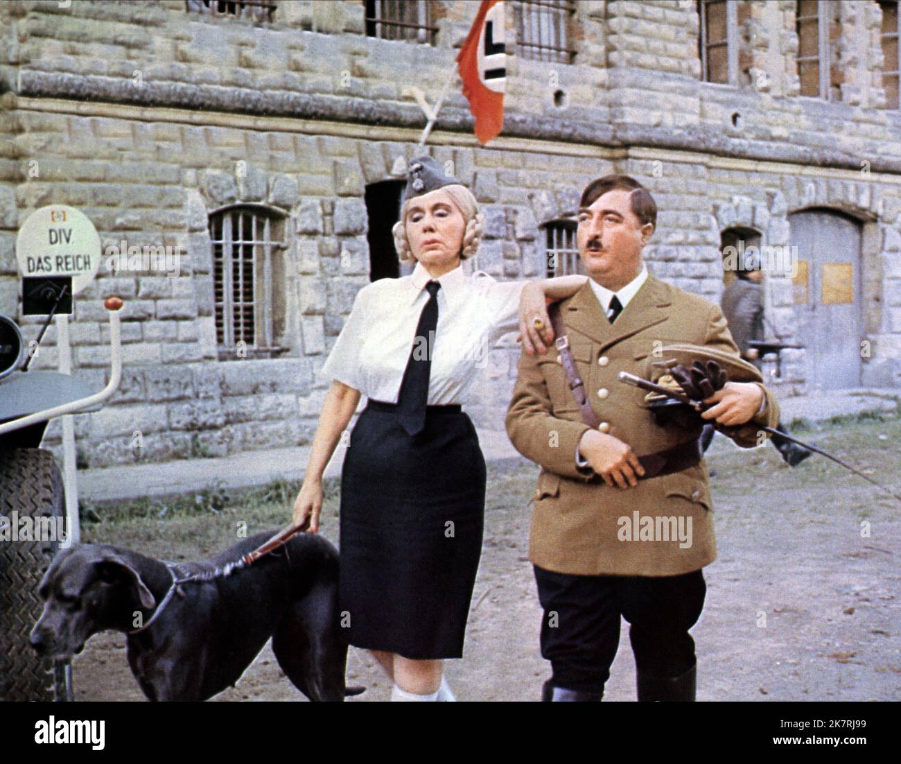 Alice Sapritch & Henri Tisot Film: Le Fuhrer En Folie (1974) Characters: Eva Braun & Adolph Hitler  Director: Philippe Clair 12 April 1974   **WARNING** This Photograph is for editorial use only and is the copyright of LES FILMS DE LA SEINE and/or the Photographer assigned by the Film or Production Company and can only be reproduced by publications in conjunction with the promotion of the above Film. A Mandatory Credit To LES FILMS DE LA SEINE is required. The Photographer should also be credited when known. No commercial use can be granted without written authority from the Film Company. Stock Photo