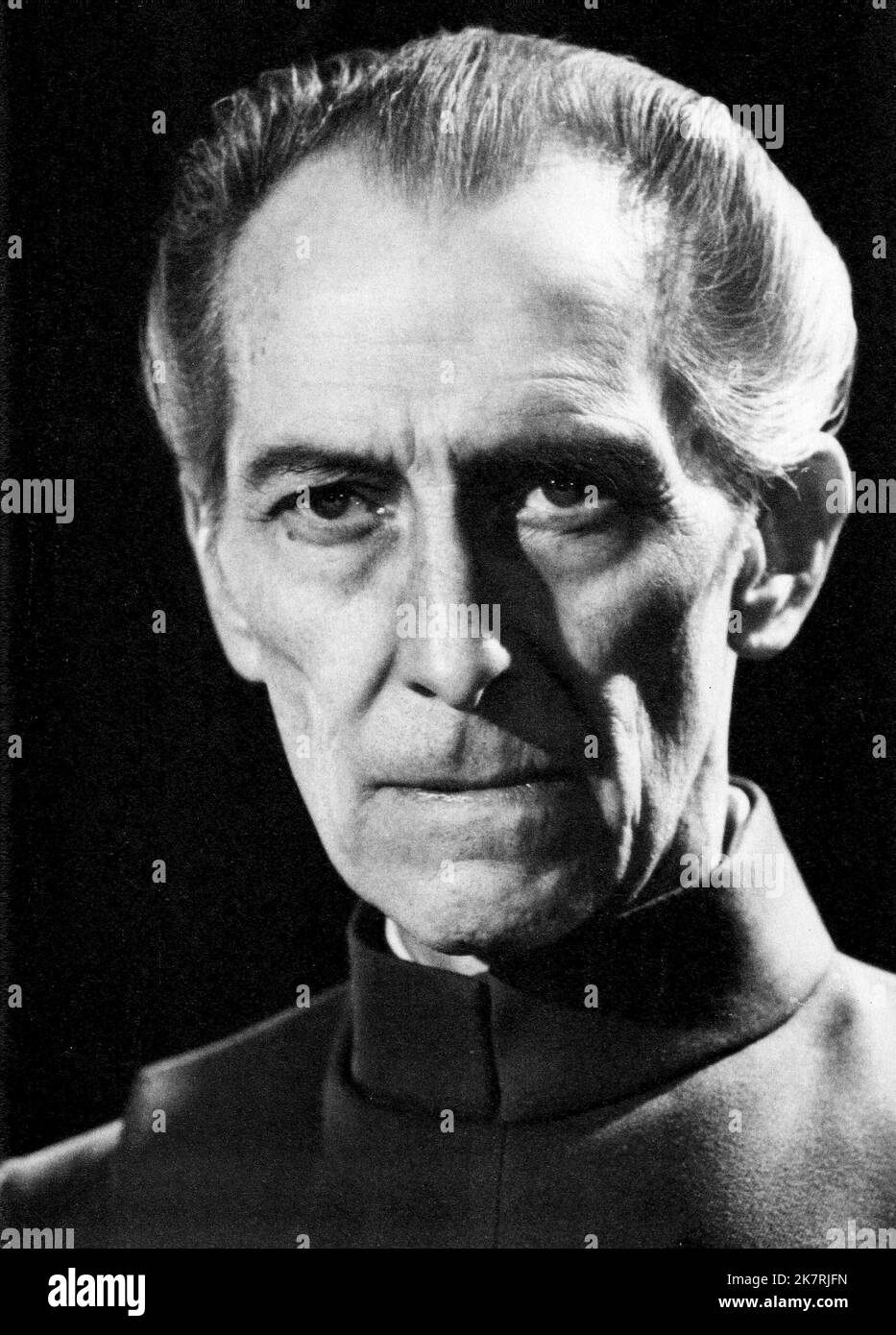 Peter Cushing Film: Star Wars: Episode Iv - A New Hope (USA 1977) Characters: GRAND MOFF TARKIN  / Neuer Titel Auch: 'Star Wars: Episode Iv – Eine Neue Hoffnung' Director: George Lucas 25 May 1977   **WARNING** This Photograph is for editorial use only and is the copyright of LUCASFILM and/or the Photographer assigned by the Film or Production Company and can only be reproduced by publications in conjunction with the promotion of the above Film. A Mandatory Credit To LUCASFILM is required. The Photographer should also be credited when known. No commercial use can be granted without written aut Stock Photo
