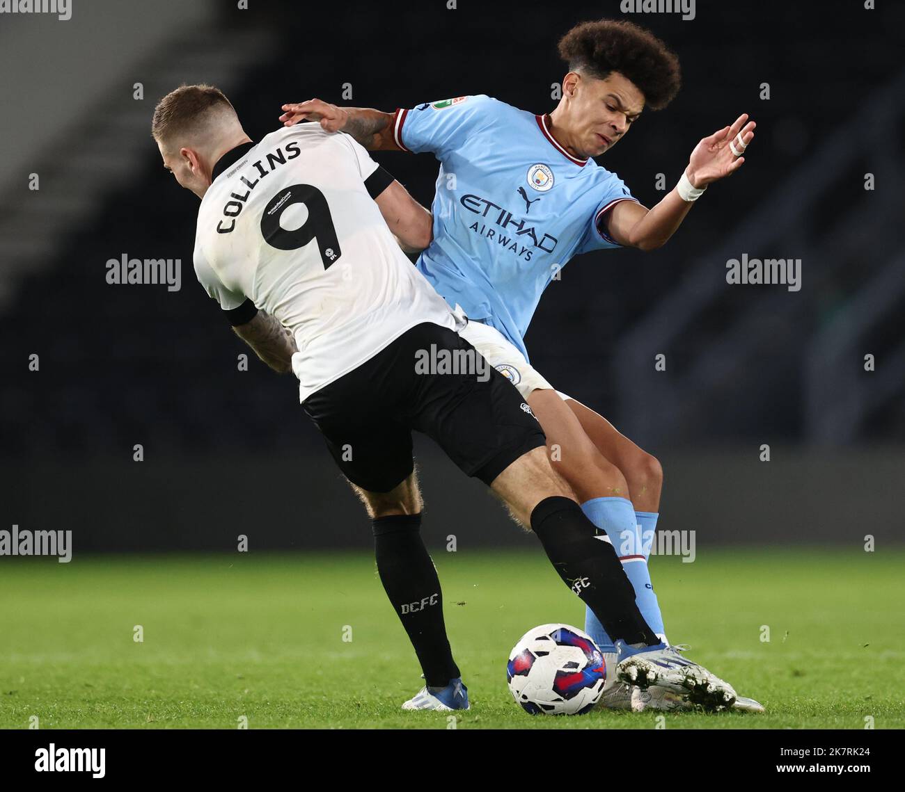 Derby, England, 18th October 2022.   Nico OÕReilly of Manchester City challenges James Collins of Derby County during the Papa Johns Trophy match at Pride Park Stadium, Derby. Picture credit should read: Darren Staples / Sportimage Stock Photo