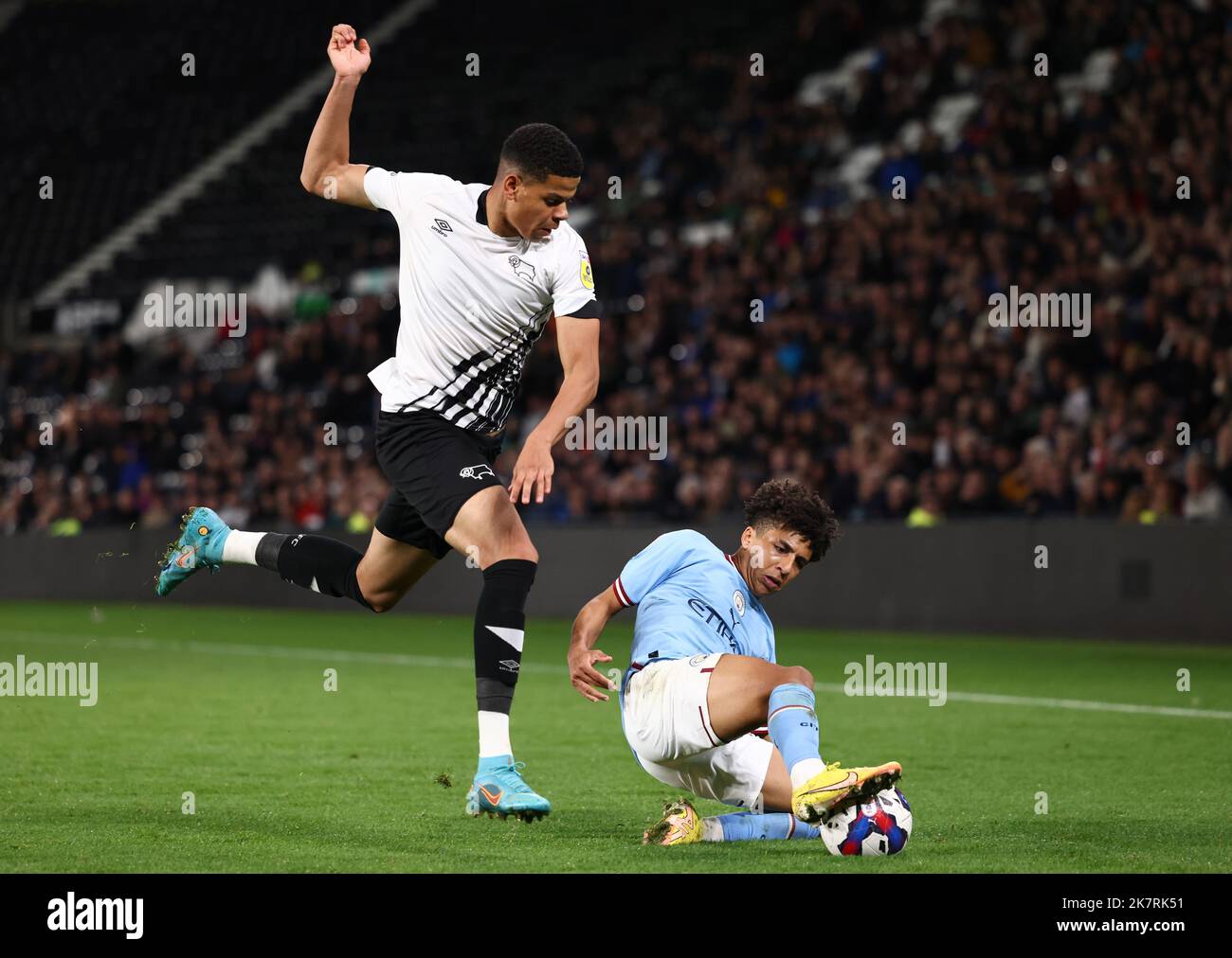 Derby, England, 18th October 2022.   William Osula of Derby County challenges Rico Lewis of Manchester City during the Papa Johns Trophy match at Pride Park Stadium, Derby. Picture credit should read: Darren Staples / Sportimage Stock Photo