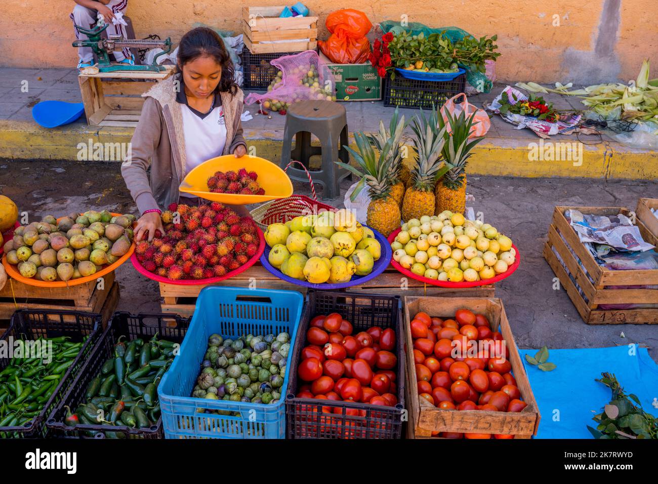 A produce stand on the daily market in Teotitlan del Valle, a small town in the Valles Centrales Region near Oaxaca, southern Mexico. Stock Photo