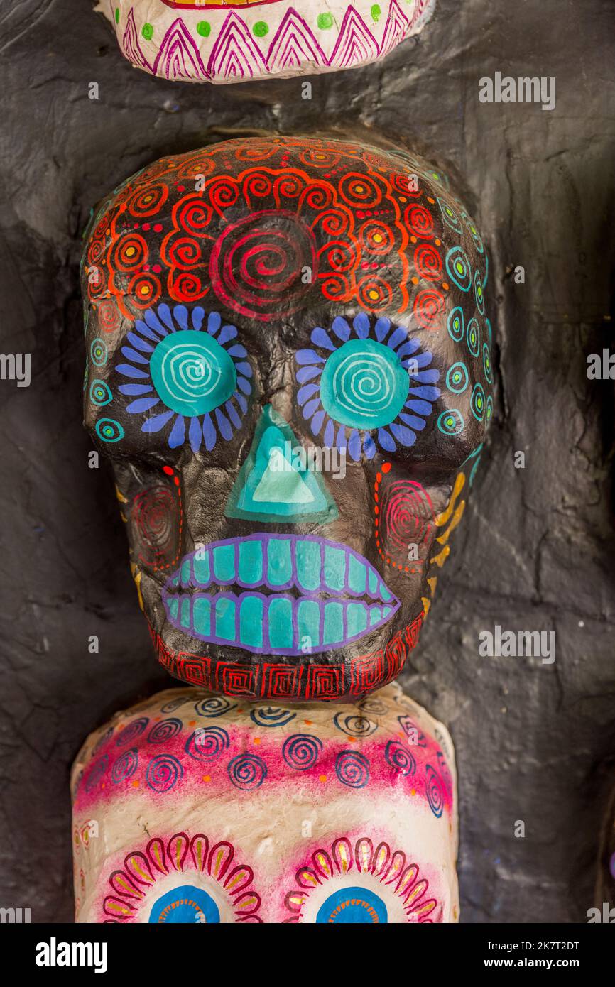 Skulls on a wall of a restaurant near the village of San Martin Tilcajete near Oaxaca, Mexico. Stock Photo