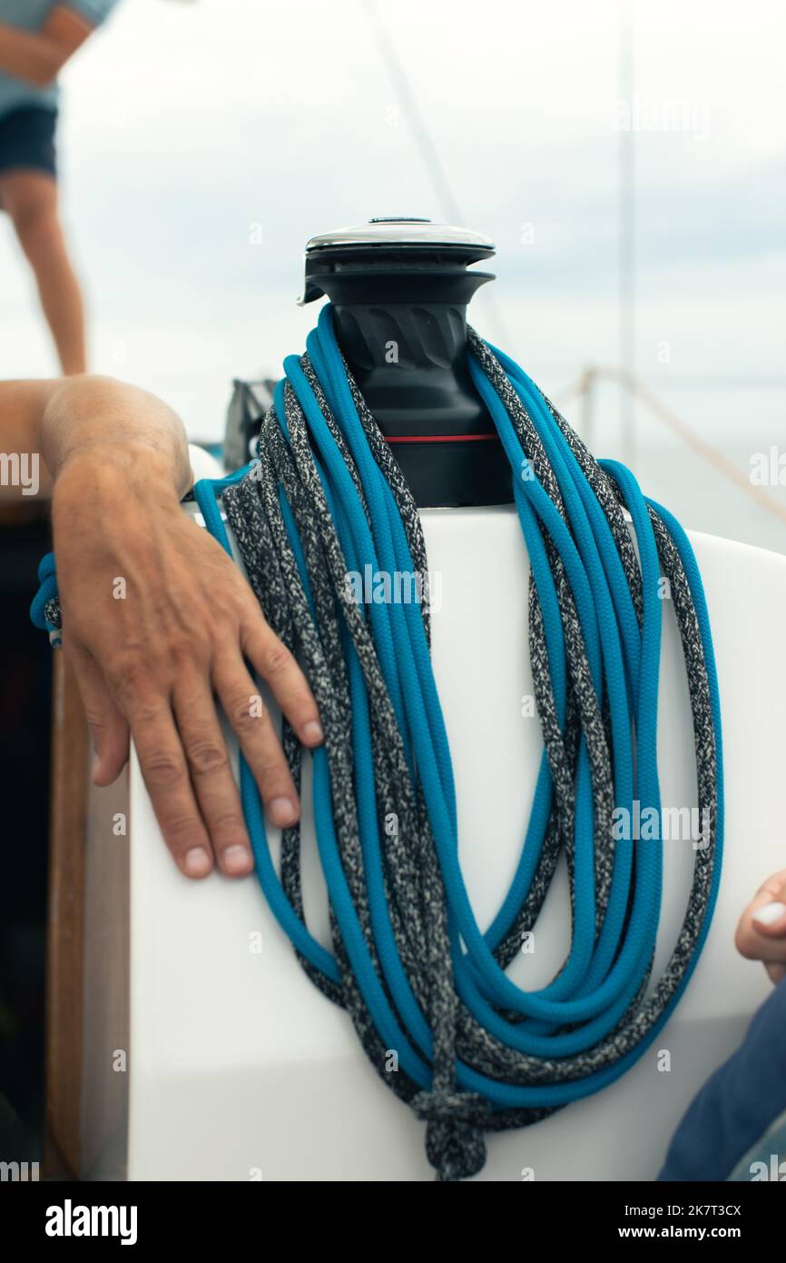 Yacht rigging, sailboat winch and rope. Vertical photo Stock Photo Alamy
