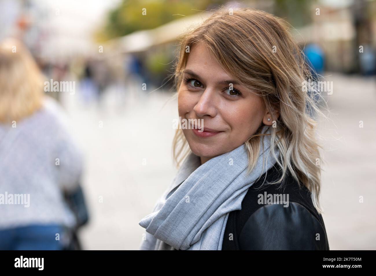 Portrait of a beautiful young woman in jacket, posing outdoor Stock ...