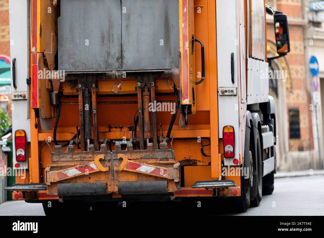 Picture of a garbage truck collecting waste in a big city Stock Photo