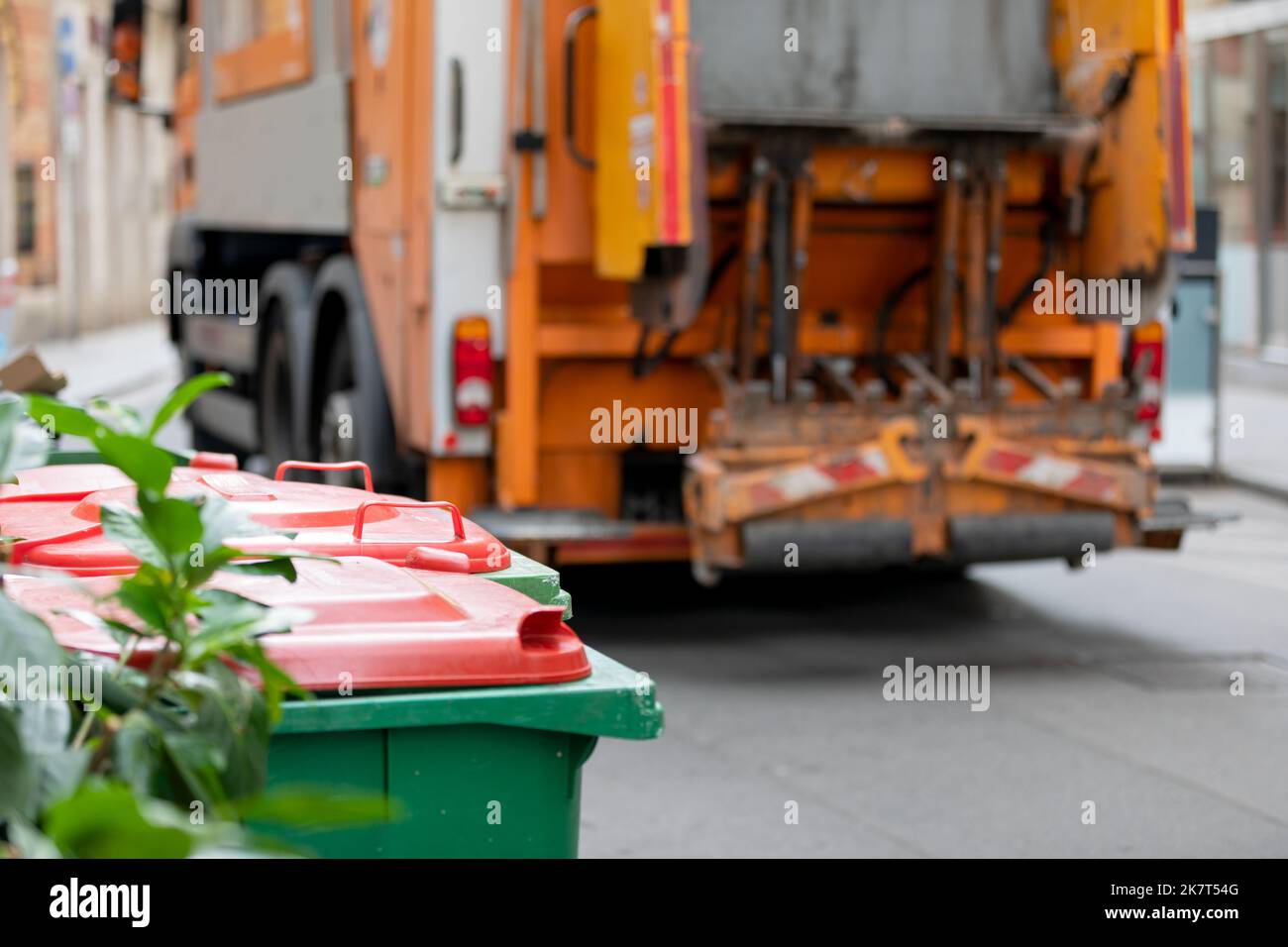 Picture of a garbage truck collecting waste in a big city Stock Photo