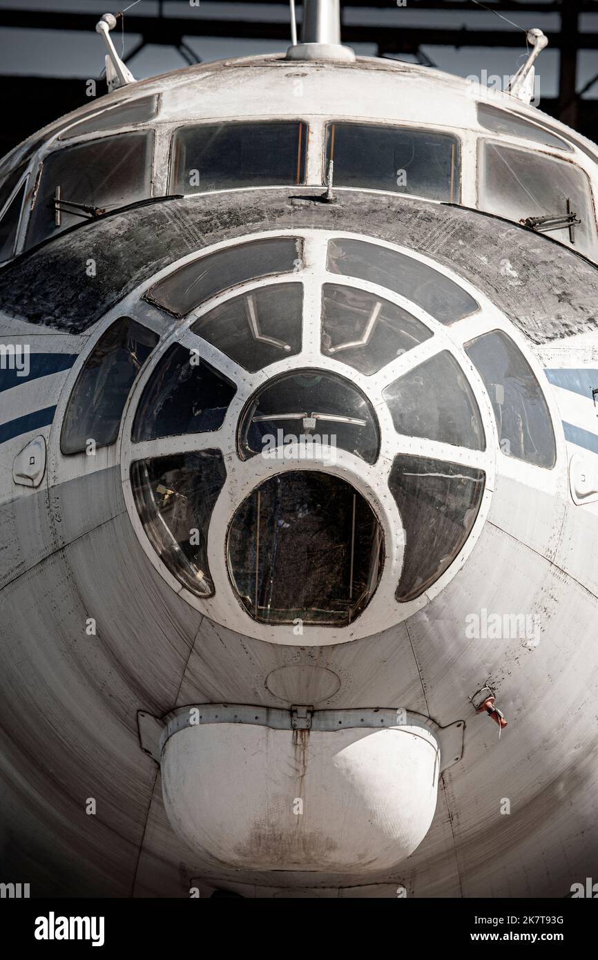 an old plane on the ground, in an old hangar Stock Photo - Alamy
