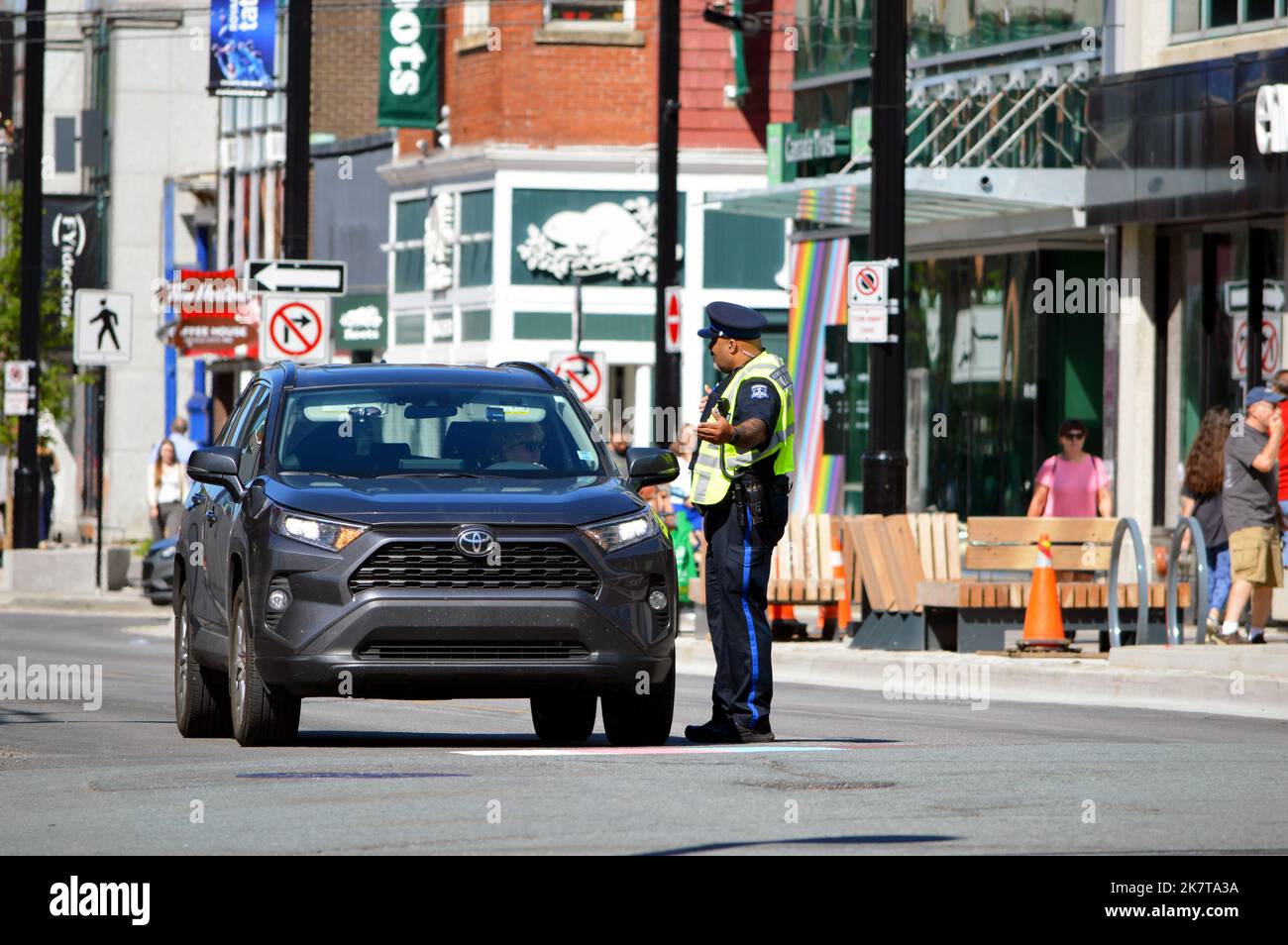 Halifax Regional Police officer on traffic control duty on the first day of the Spring Garden Road transit-only pilot scheme, 2022. Stock Photo