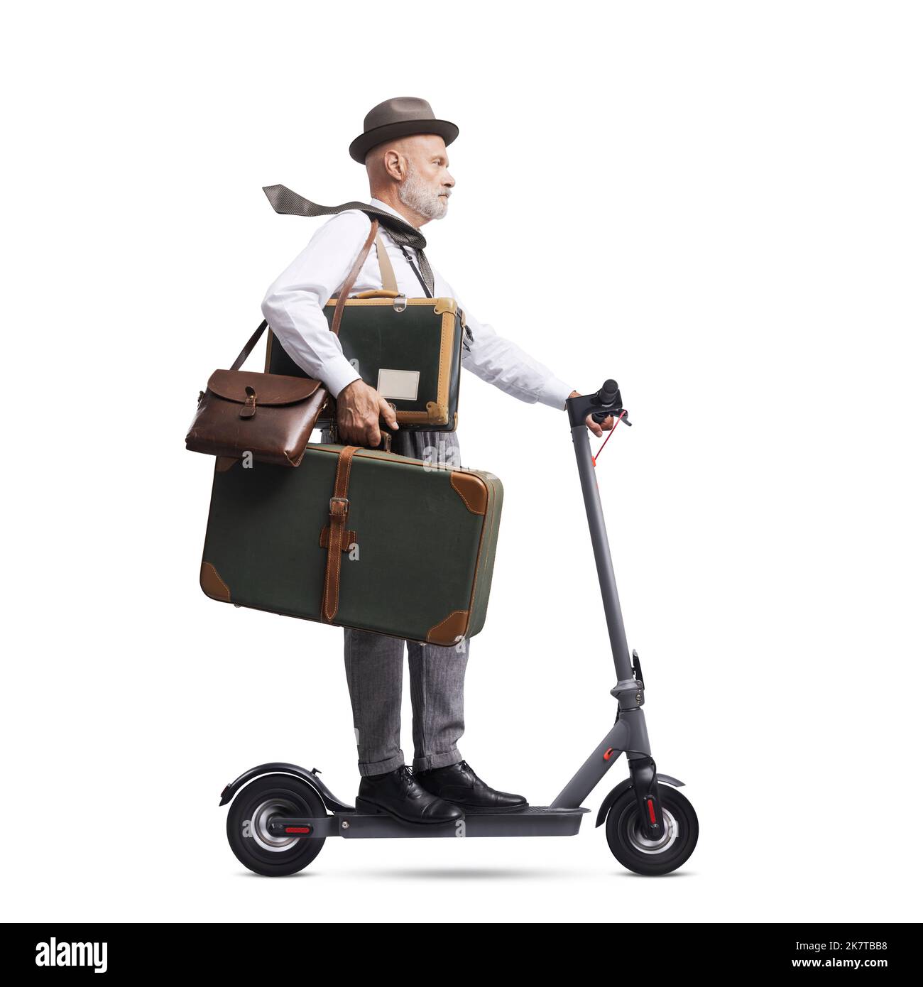 Retro style traveler and photographer carrying luggage and riding an