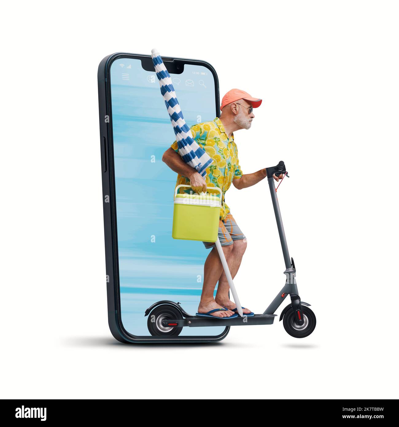 Funny senior tourist riding an electric scooter and going to the beach, he is coming out from a smartphone screen, isolated on white background Stock Photo