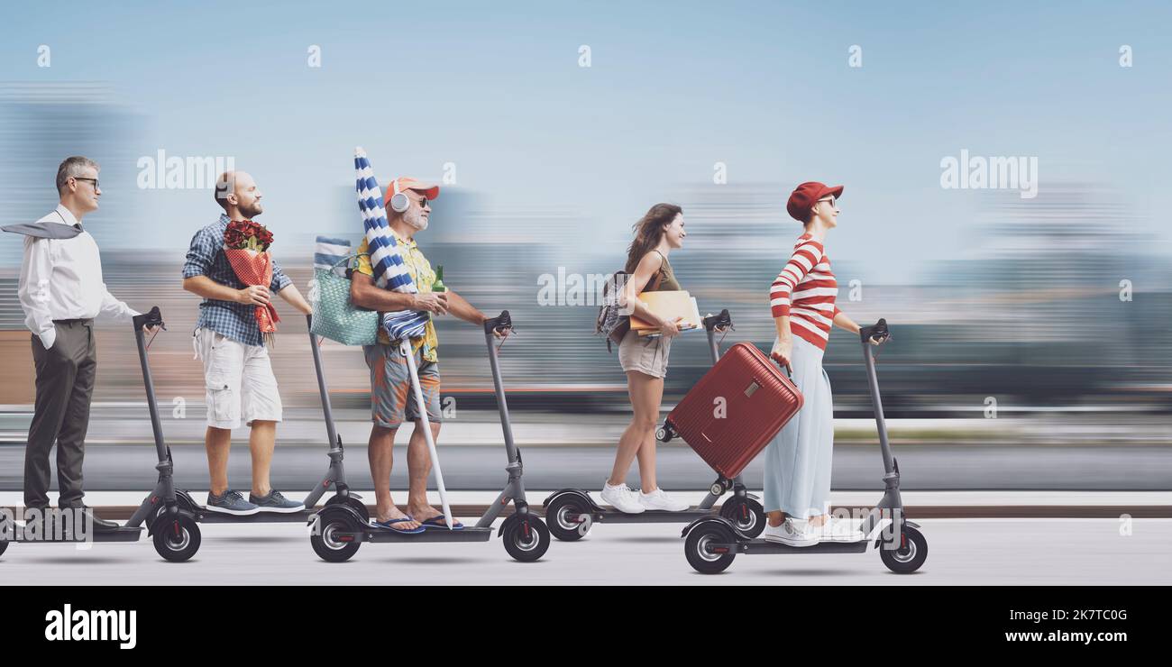 Crowd of diverse people riding electric scooters in the city street, smart mobility and traffic concept Stock Photo