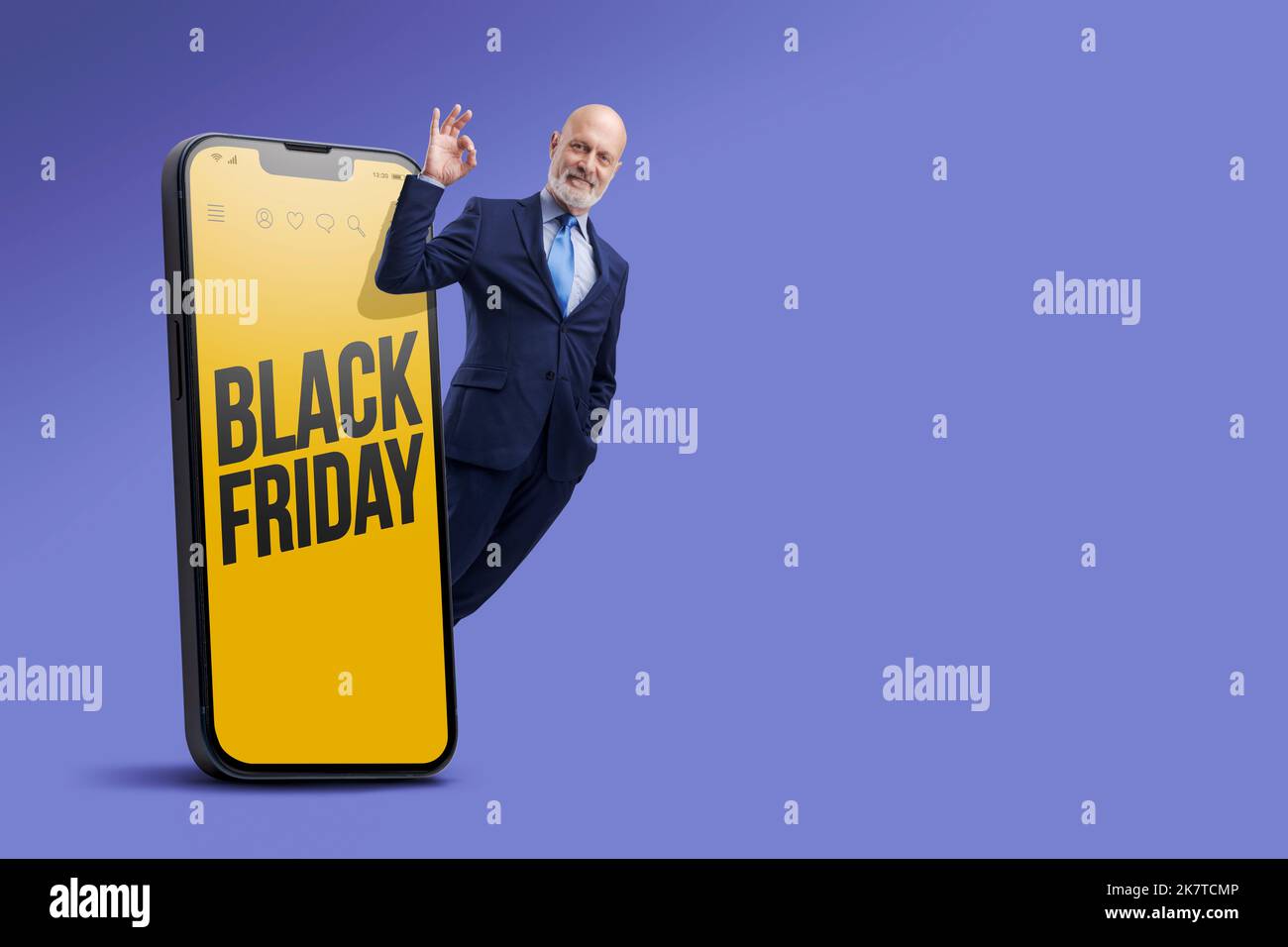 Black Friday sale and happy cheerful man making the OK gesture, offers and online shopping concept Stock Photo