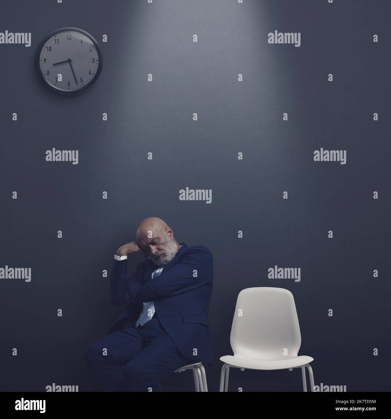 Businessman sleeping in the waiting room at night, he has been waiting ...