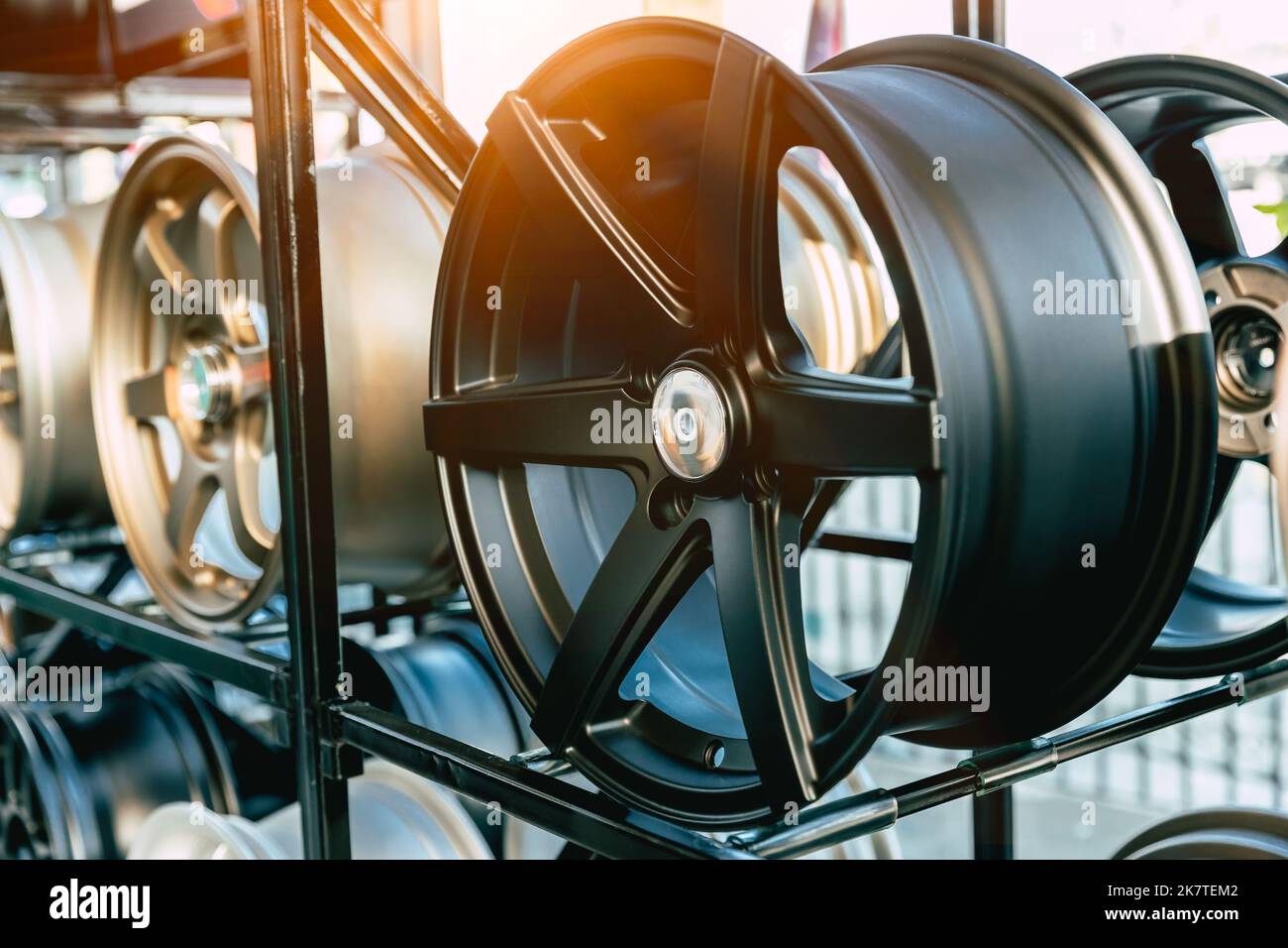 sport luxury alloy wheel car rims in garage store for sale Stock Photo