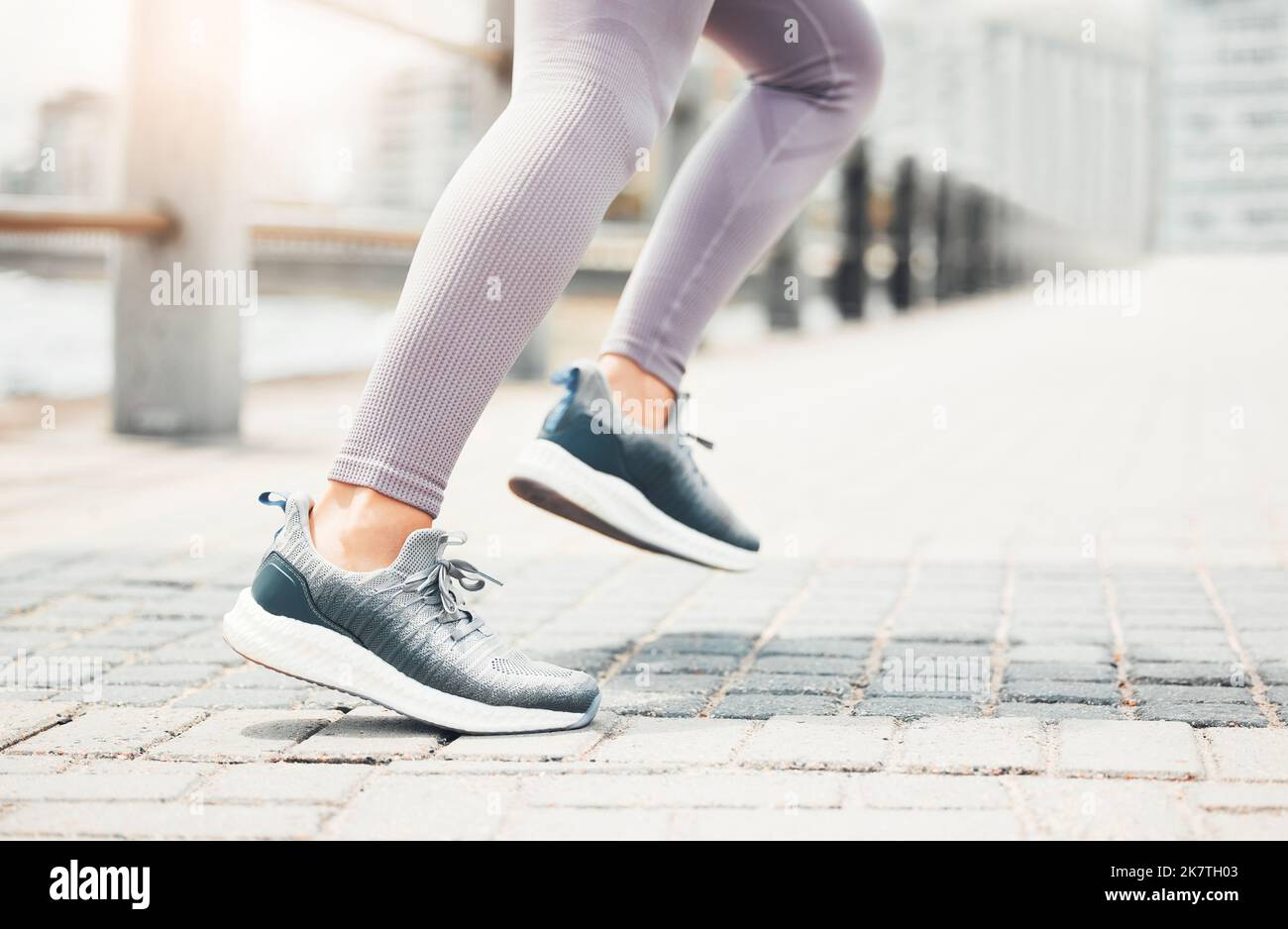 Running shoes, feet sneakers and city cardio exercise, marathon and