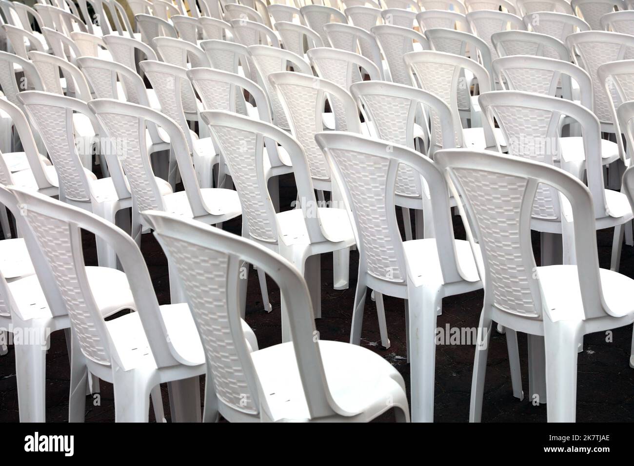Rows of white seats. Empty chairs in the conference hall. Stock Photo