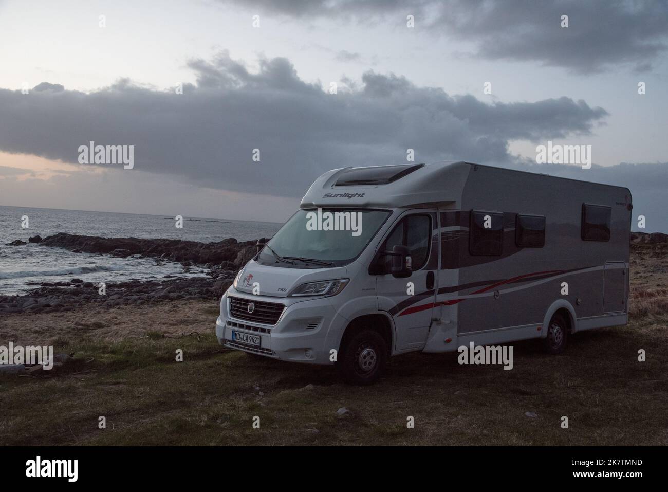 Campervan parking at the shores of the Norwegian Sea on Vestvågøya