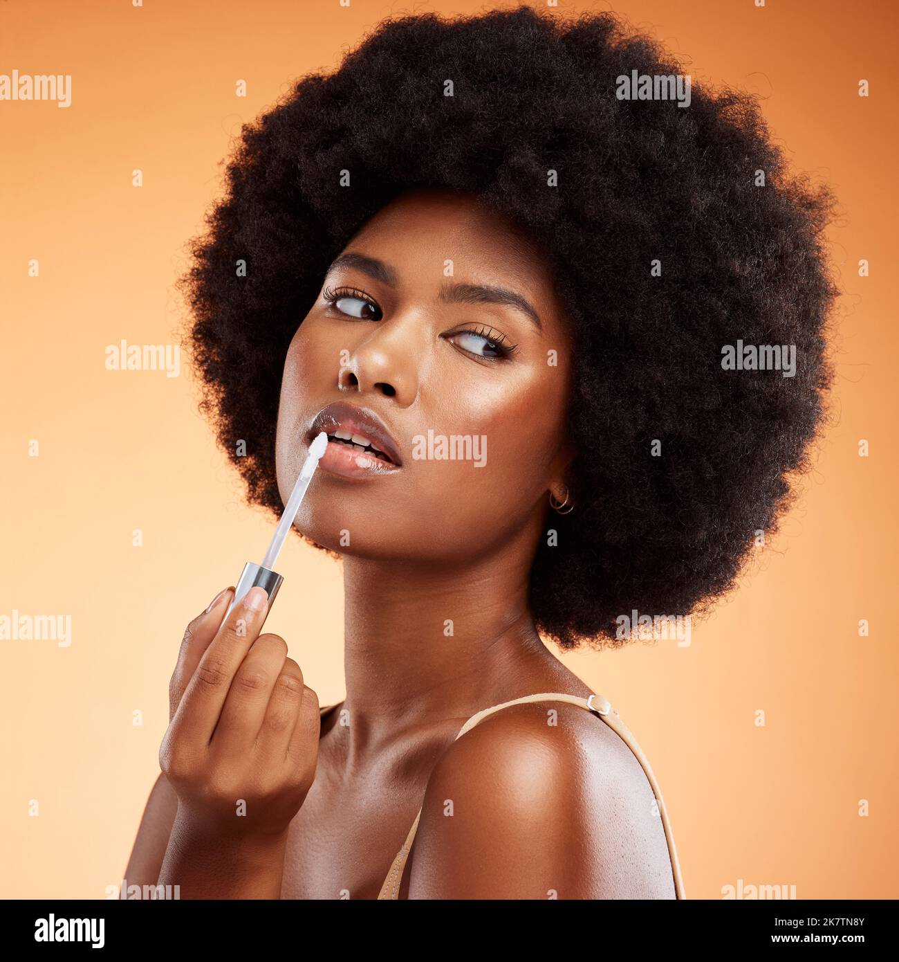 Black african girl lip gloss hi-res stock photography and images - Alamy