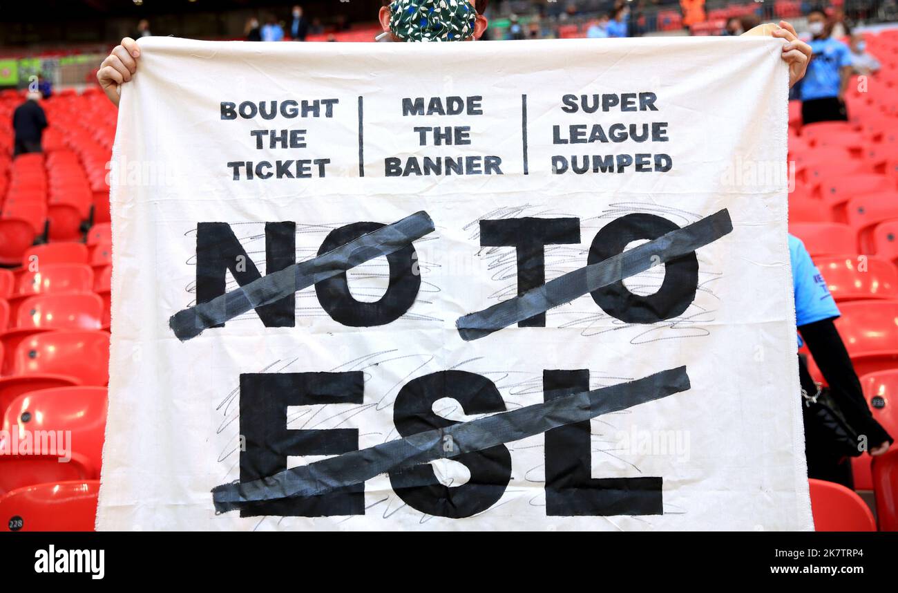 File photo dated 25-04-2021 of A fan in the stands holds up a banner protesting against the European Super League. A new European Super League with no permanent membership could be up and running by the 2024-25 season, the chief executive of the company behind the failed project has revealed. Bernd Reichart has been hired by A22 Sports Management, which was formed to sponsor and assist in the creation of the proposed 12-team breakaway league in April last year. Picture date: Sunday April 25, 2021. Issue date: Wednesday October 19, 2022. Stock Photo