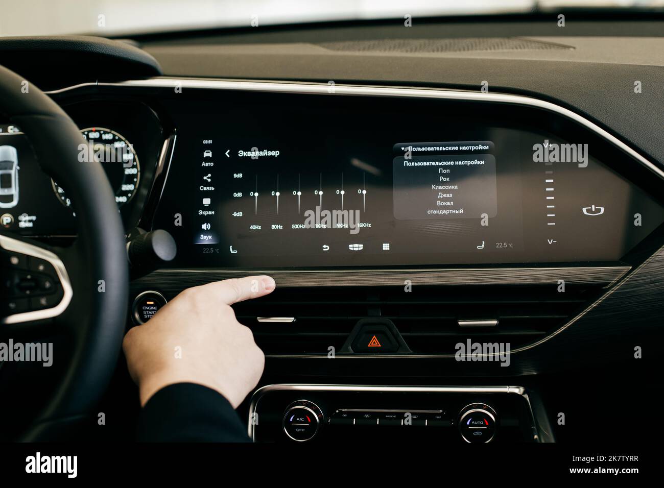 Car dashboard. Radio closeup. Man sets up radio Stock Photo Alamy