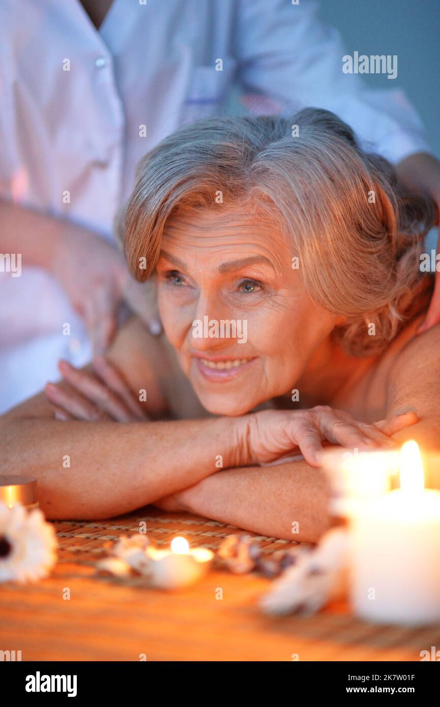 Woman laying down on a bed hires stock photography and images Alamy