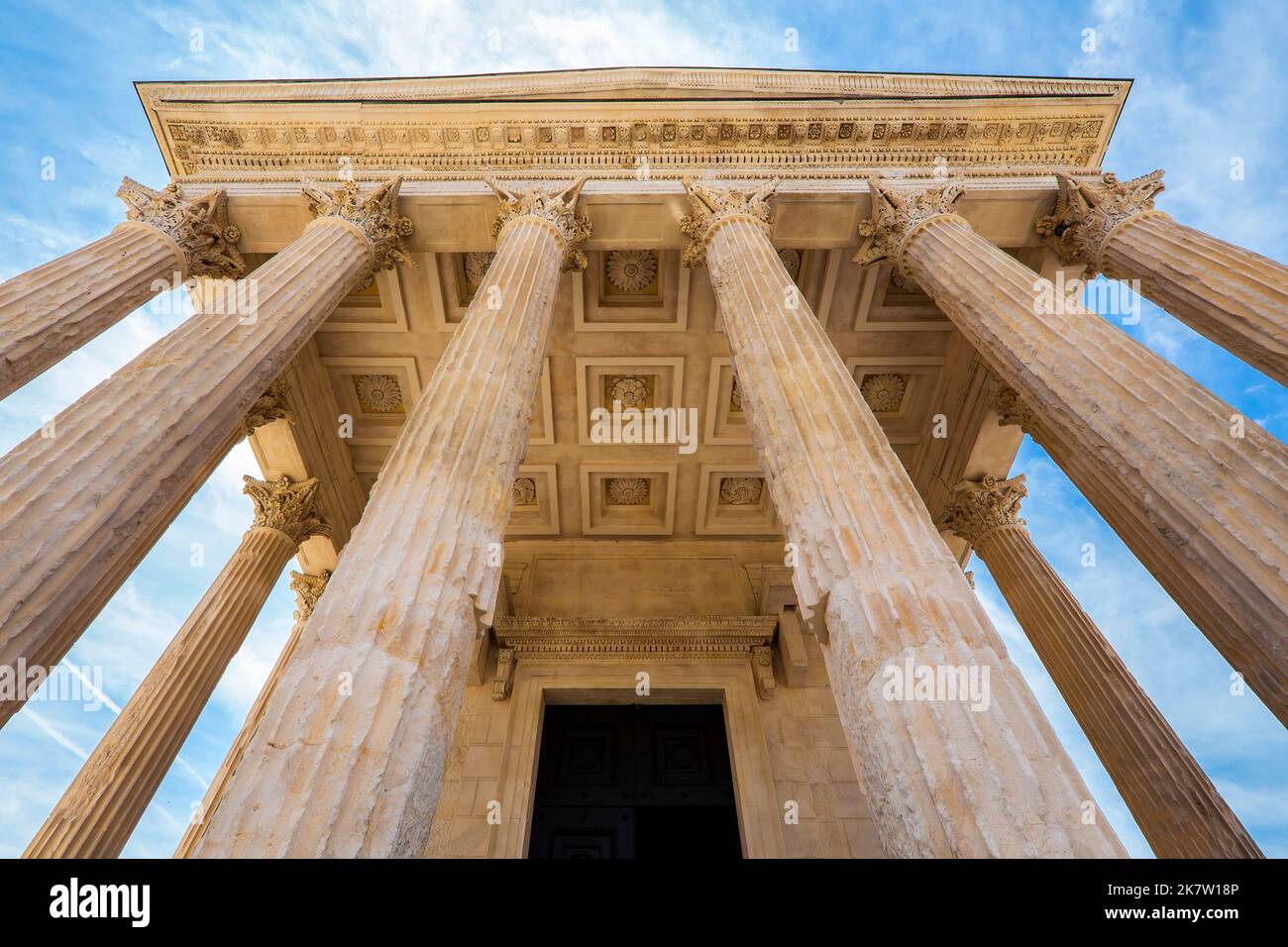 The Maison Carrée is an ancient building in Nîmes, France. The temple is believed to have been built possibly around 19BC, commissioned by Marcus Agri Stock Photo