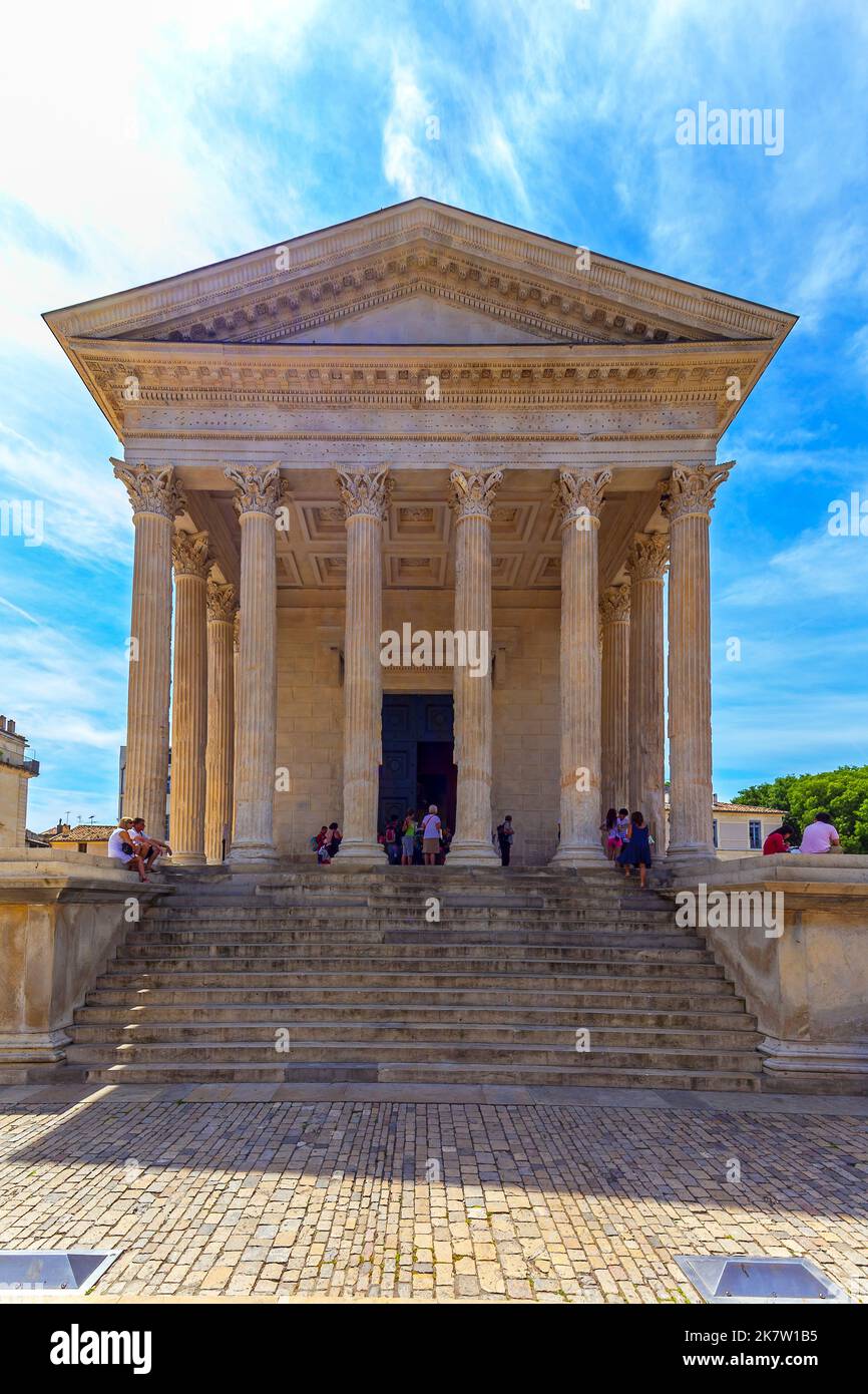 The Maison Carrée is an ancient building in Nîmes, France. The temple is believed to have been built possibly around 19BC, commissioned by Marcus Agri Stock Photo