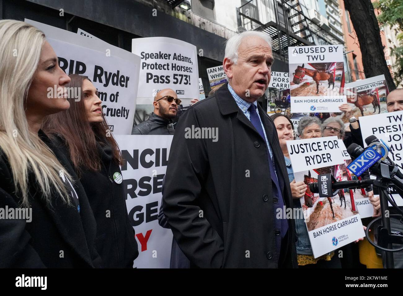 Robert Holden, New York City Council and Sponsor of Bill 573, speaks as  protesters gather for a memorial for Ryder, a NYC Carriage Horse, at the  place where he collapsed and died