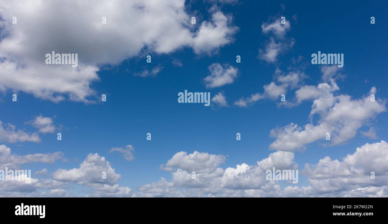 Clear blue sky and clouds over horizon Stock Photo