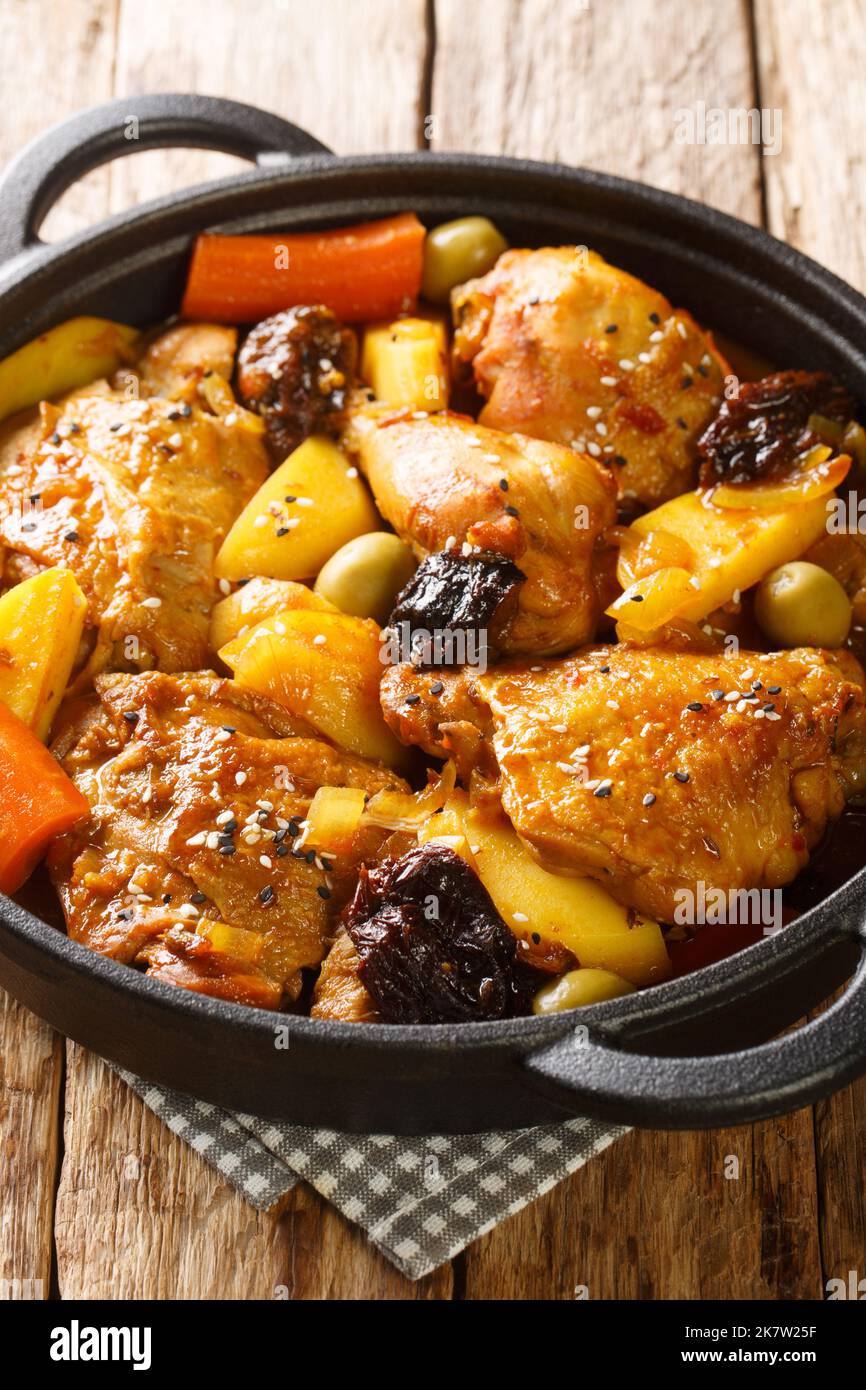 Gallo en chicha is a traditional chicken dish that is popular in El Salvador, as well as in other Central American countries closeup on the pan on the Stock Photo