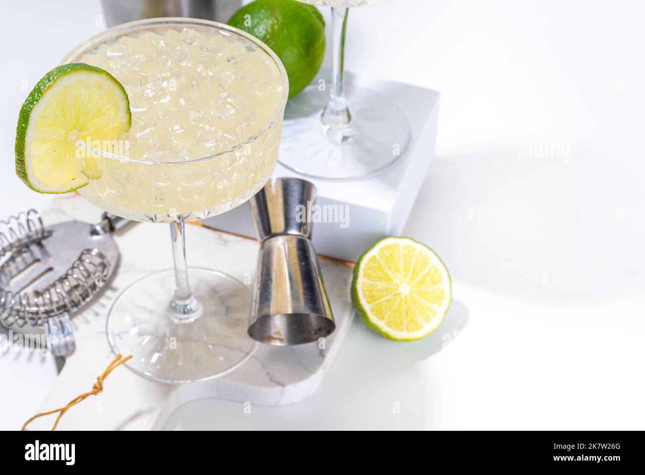 Sour alcoholic lime gin gimlet drink. Lemonade martini alcohol boozy
