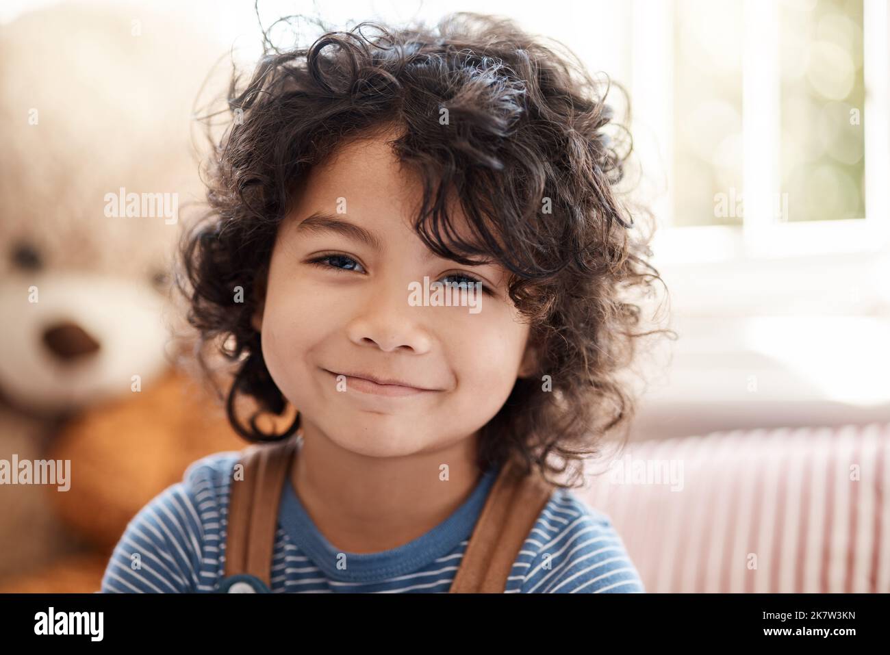 With hair wrapped like beads and stars in their eyes. Portrait of an