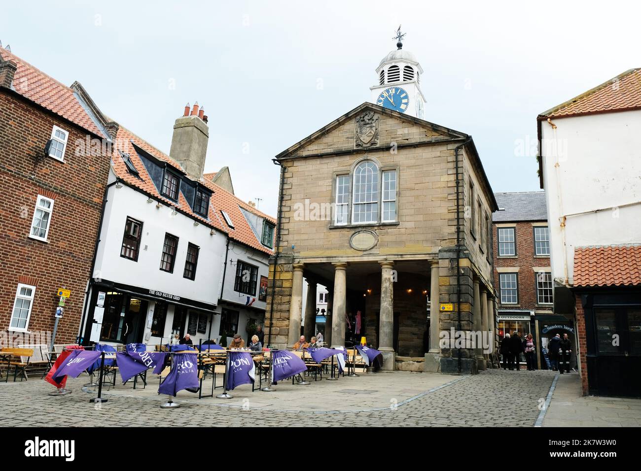 The Old Town Hall and market place now an open air Cafe, Whitby, Yorkshire, UK - John Gollop Stock Photo