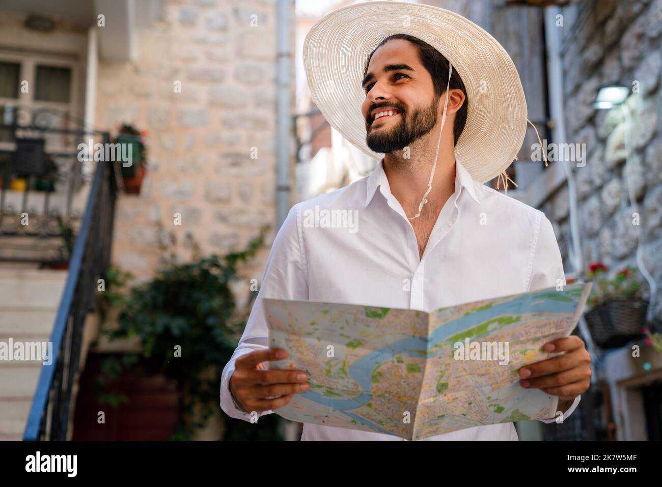 Portrait young tourist map hi-res stock photography and images - Alamy
