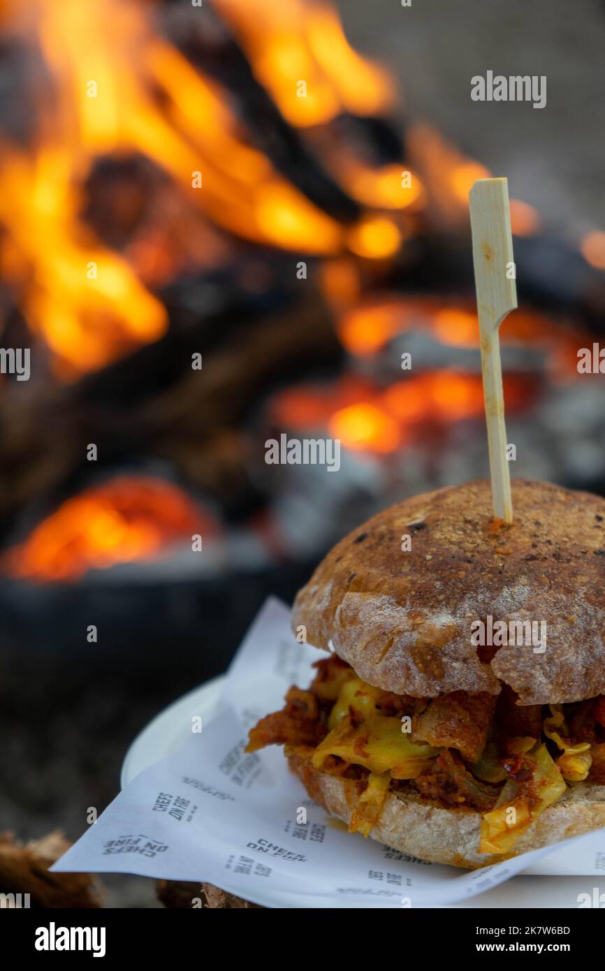 Pork Skin sandwiches by the fire, at a food festival in Estoril, Portugal. Stock Photo
