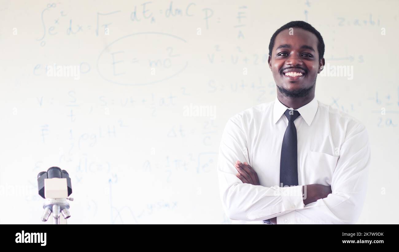 Smile African teacher is explaining science lessons inside the ...