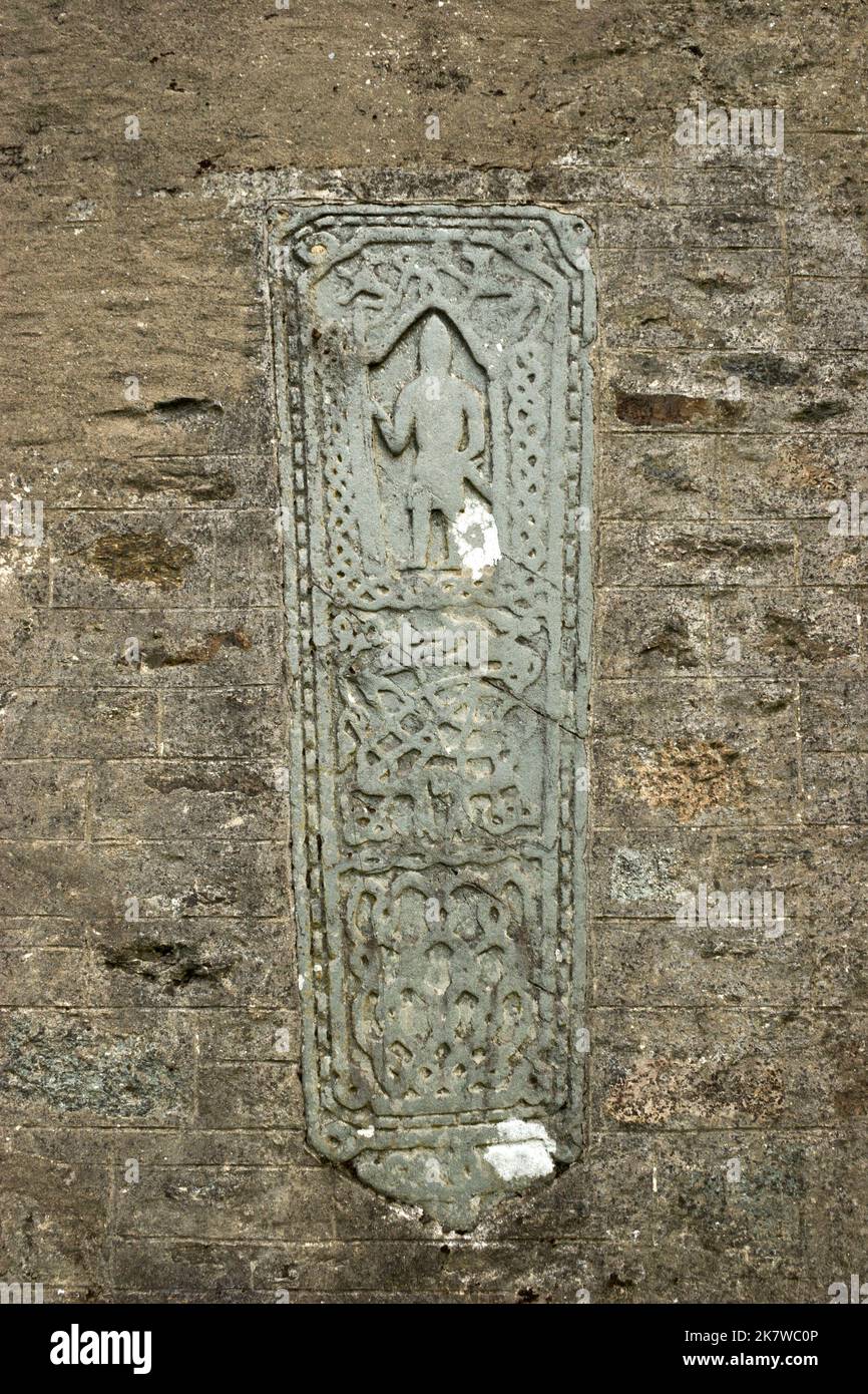 Ancient graveslabs built into the wall of Strachur Church, Argyll, Scotland Stock Photo