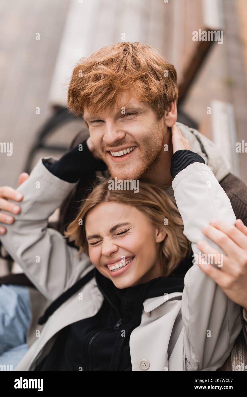 Cheerful man woman smiling hugging hi-res stock photography and images ...