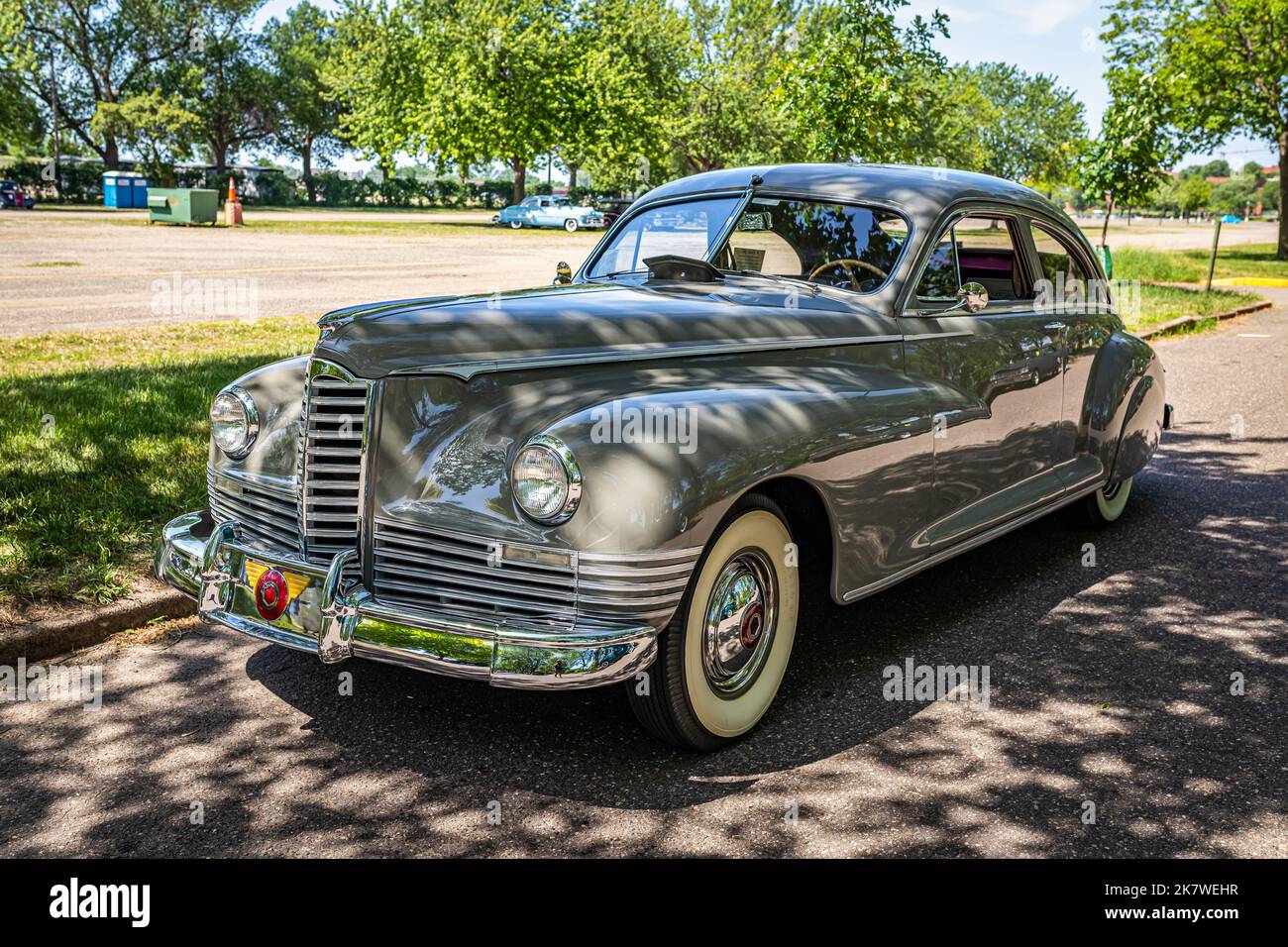 Falcon Heights, MN - June 19, 2022: High perspective front corner view of a 1947 Packard 2106 Custom Super Clipper Club Sedan at a local car show. Stock Photo