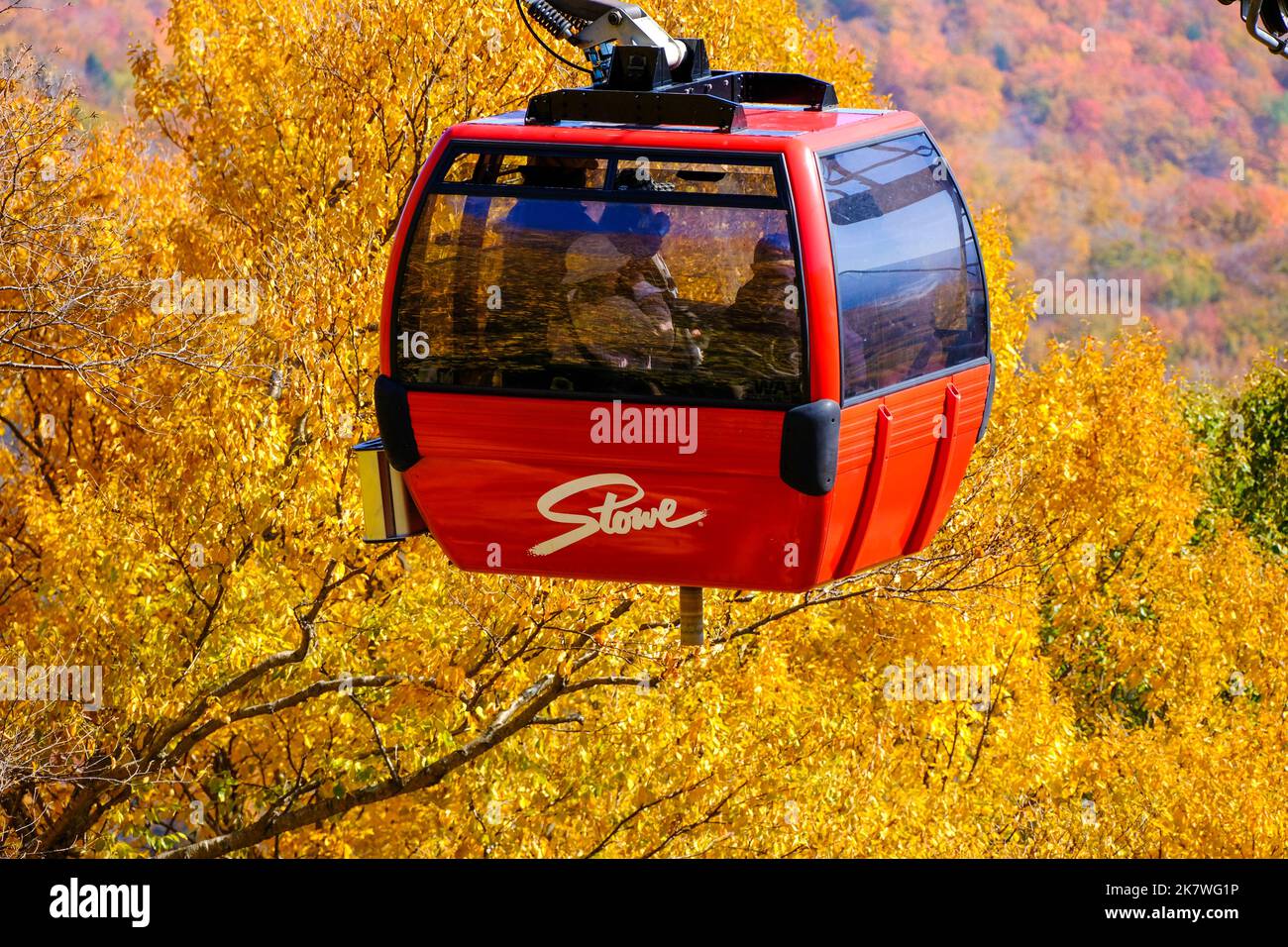 Autumn fall foliage tourists ride the gondola at Stowe Mountain Resort