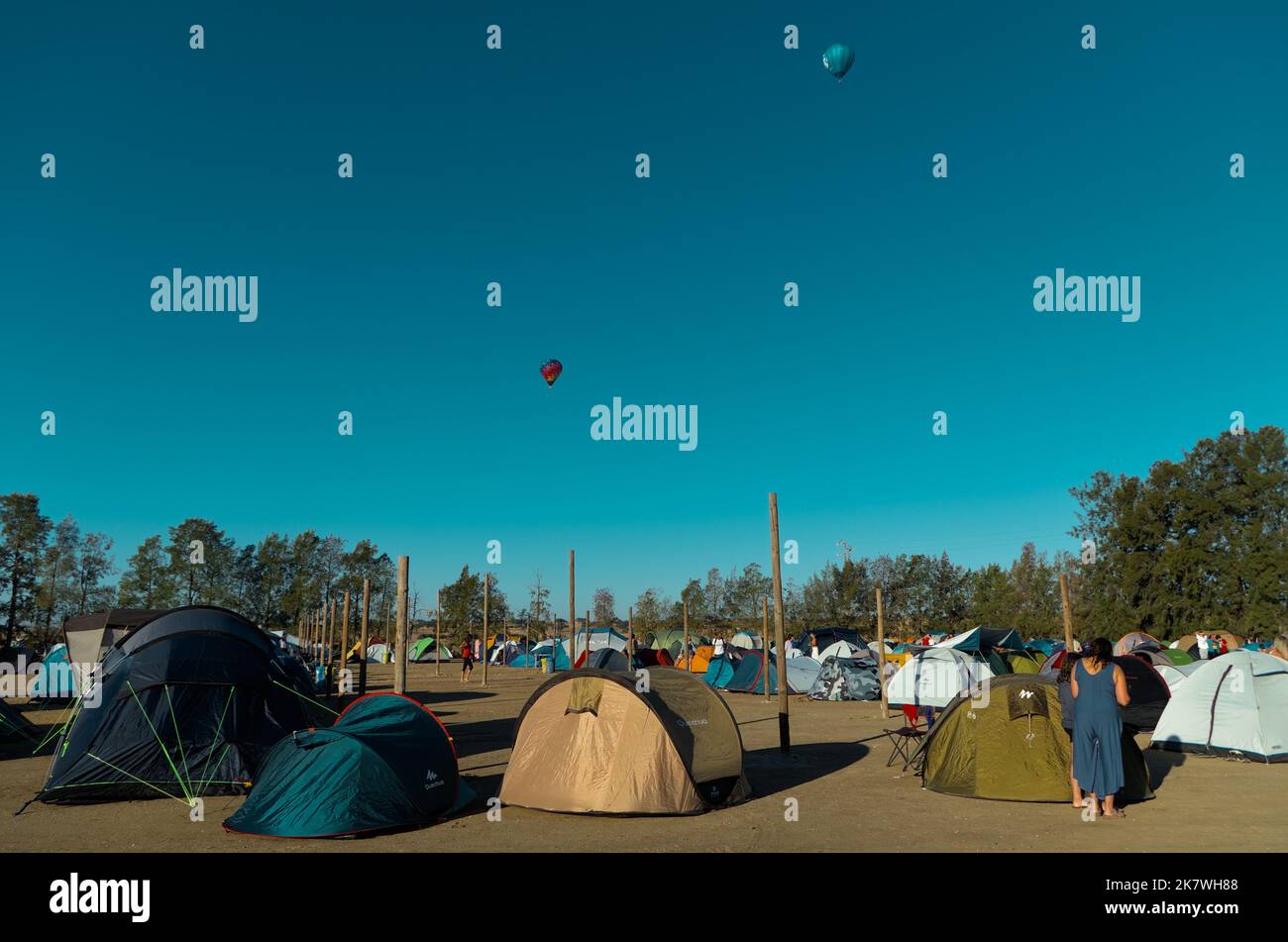 Hot Air Balloons above Andancas Festival 2022 camp site in Campinho, Alentejo, Portugal Stock Photo