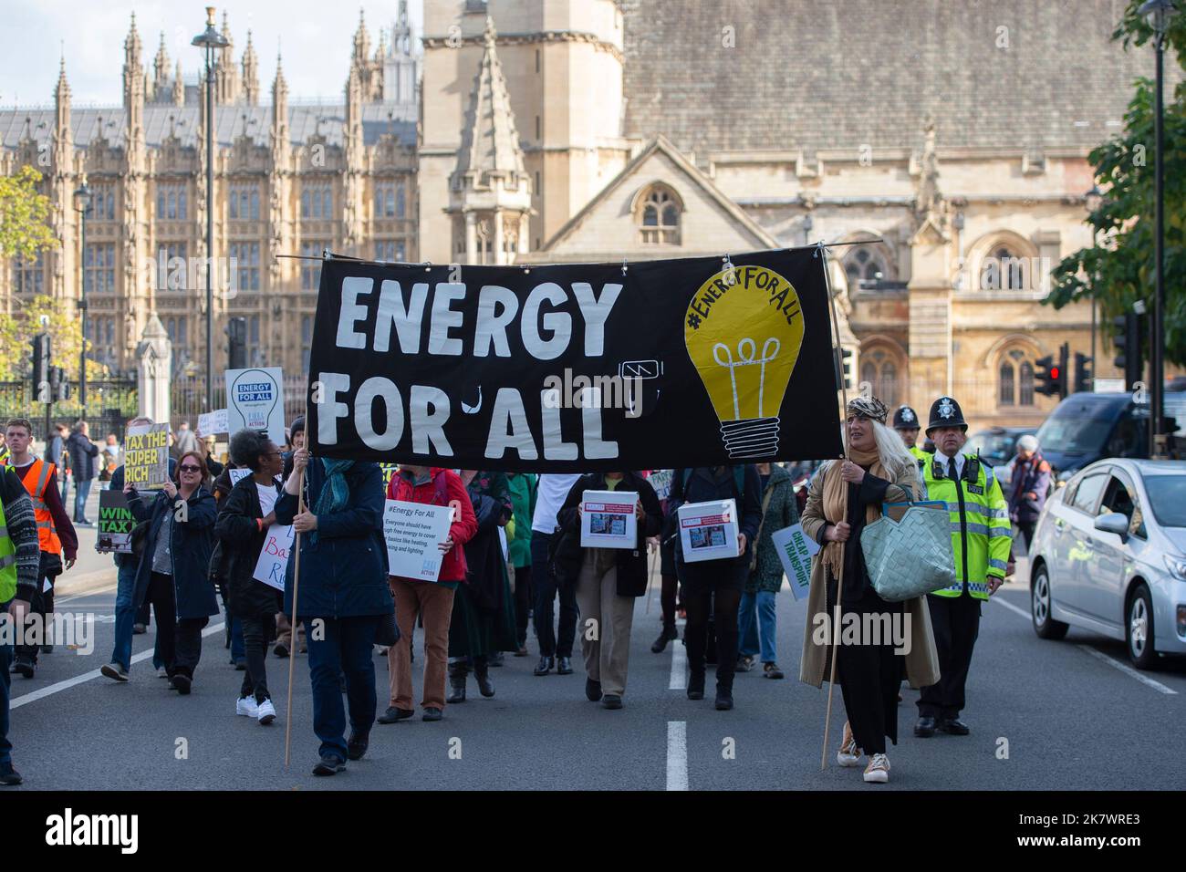 London, UK. 19 October 2022.. Campaigners march in Westminster, calling on the government to give everyone a universal free amount of energy, paid for by ending fossil fuel subsidies, windfall taxes and higher tariffs on excessive energy use, to cover necessities such as heating, lighting and cooking. Photo: David Mirzoeff/Alamy Live News Stock Photo