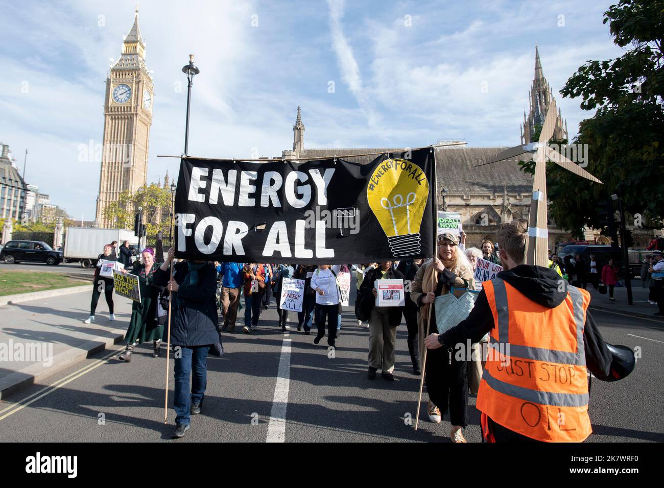 London, UK. 19 October 2022. Campaigners march in Westminster, calling on the government to give everyone a universal free amount of energy, paid for by ending fossil fuel subsidies, windfall taxes and higher tariffs on excessive energy use, to cover necessities such as heating, lighting and cooking. Photo: David Mirzoeff/Alamy Live News Stock Photo