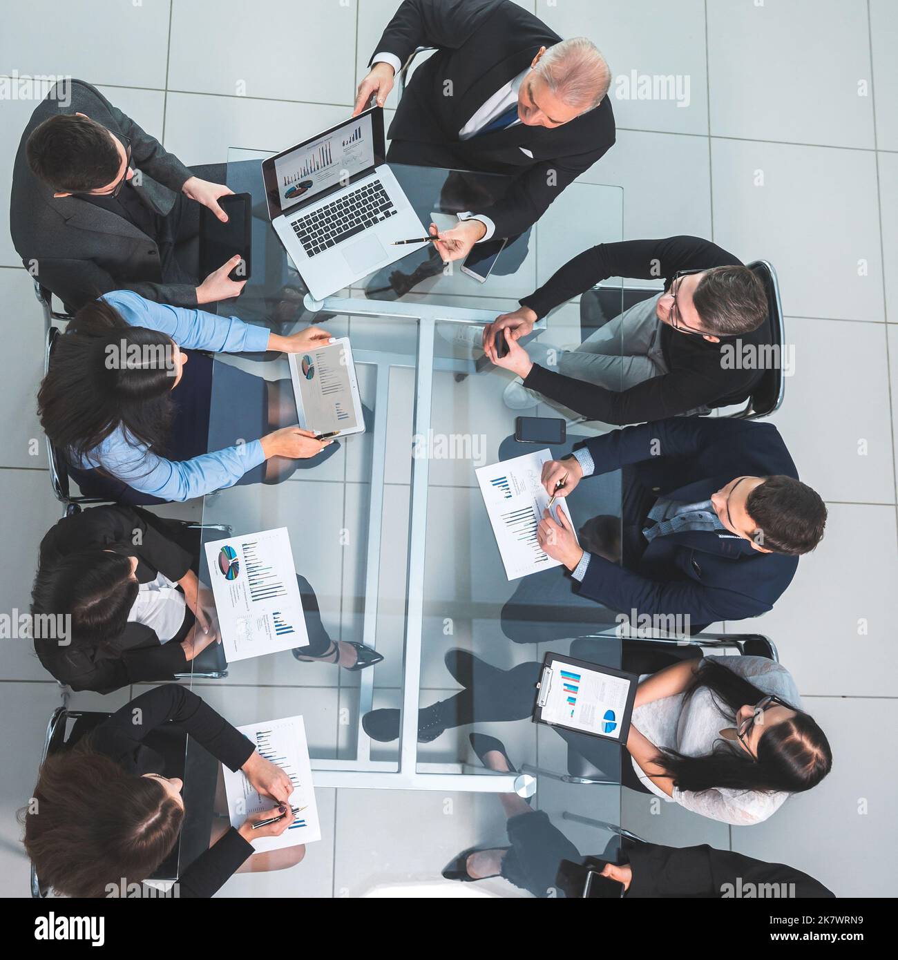 business team using a laptop to analyze financial data Stock Photo