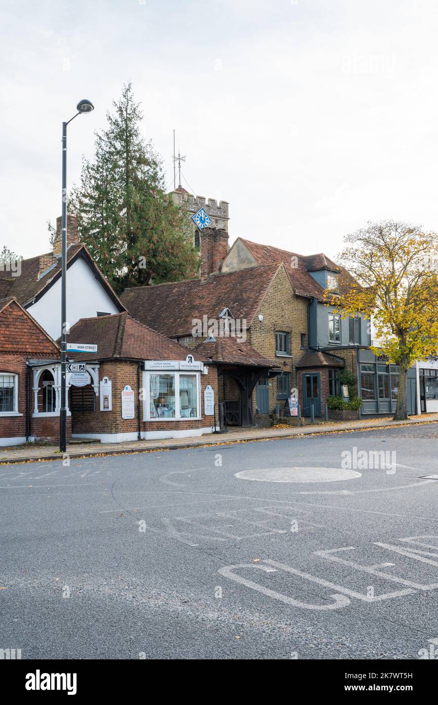 View of St Martins Church tower and shops on High Street, Ruislip, Middlesex, England, UK Stock Photo